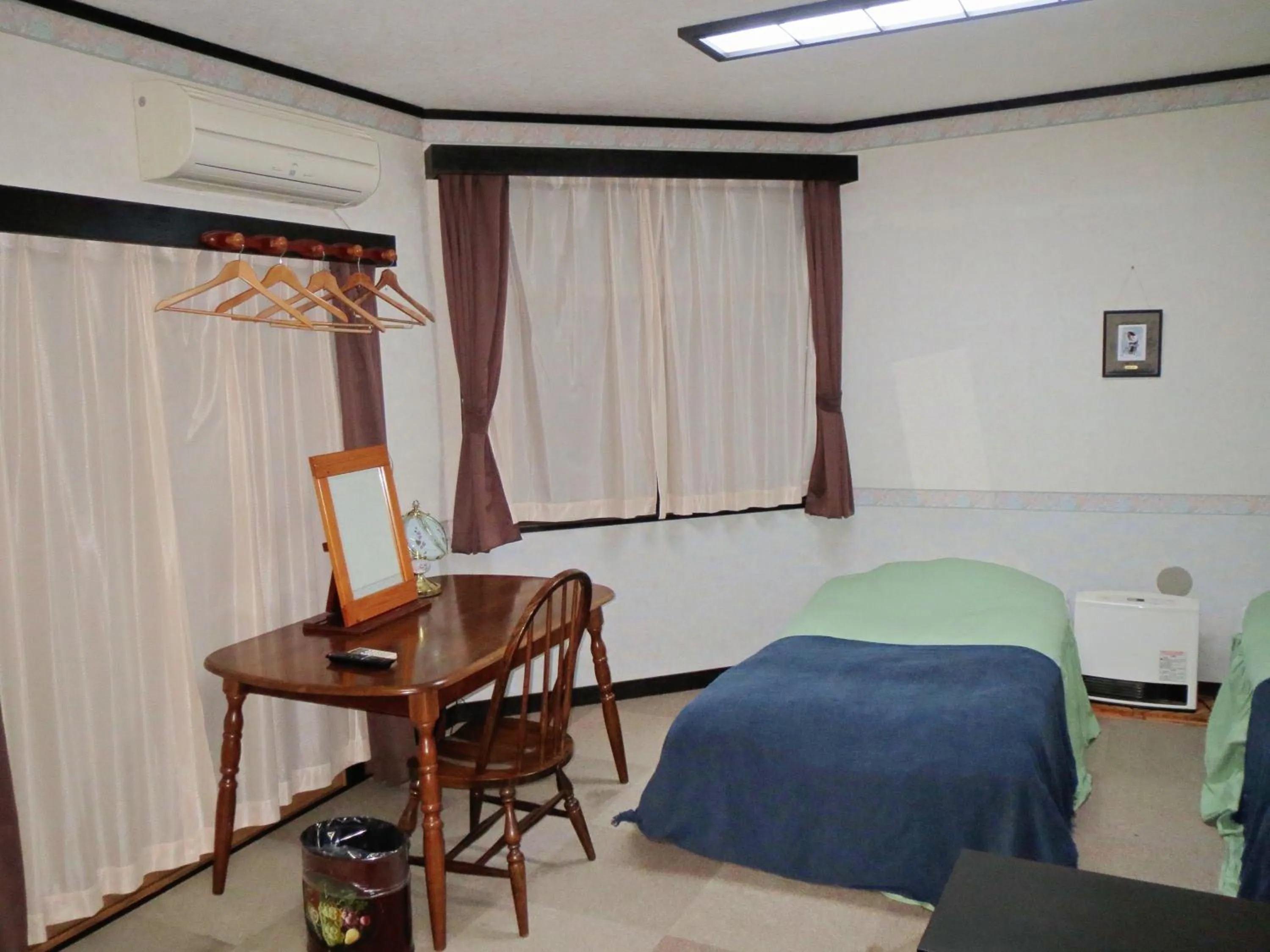 Photo of the whole room, Bed in Pension Marionette