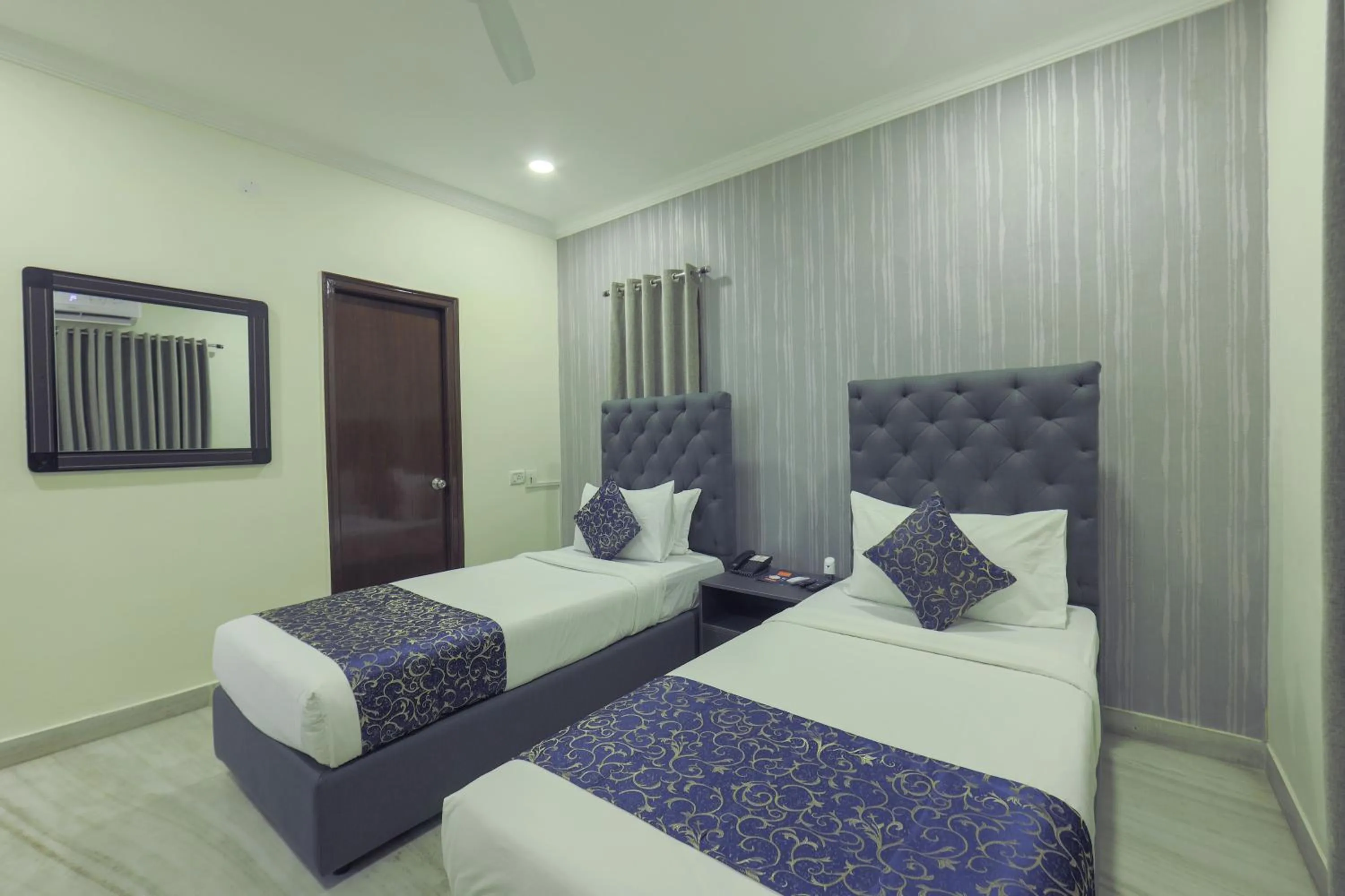 Bed in Hotel Athome & Serviced Apartments by Deccan Serai Hotels