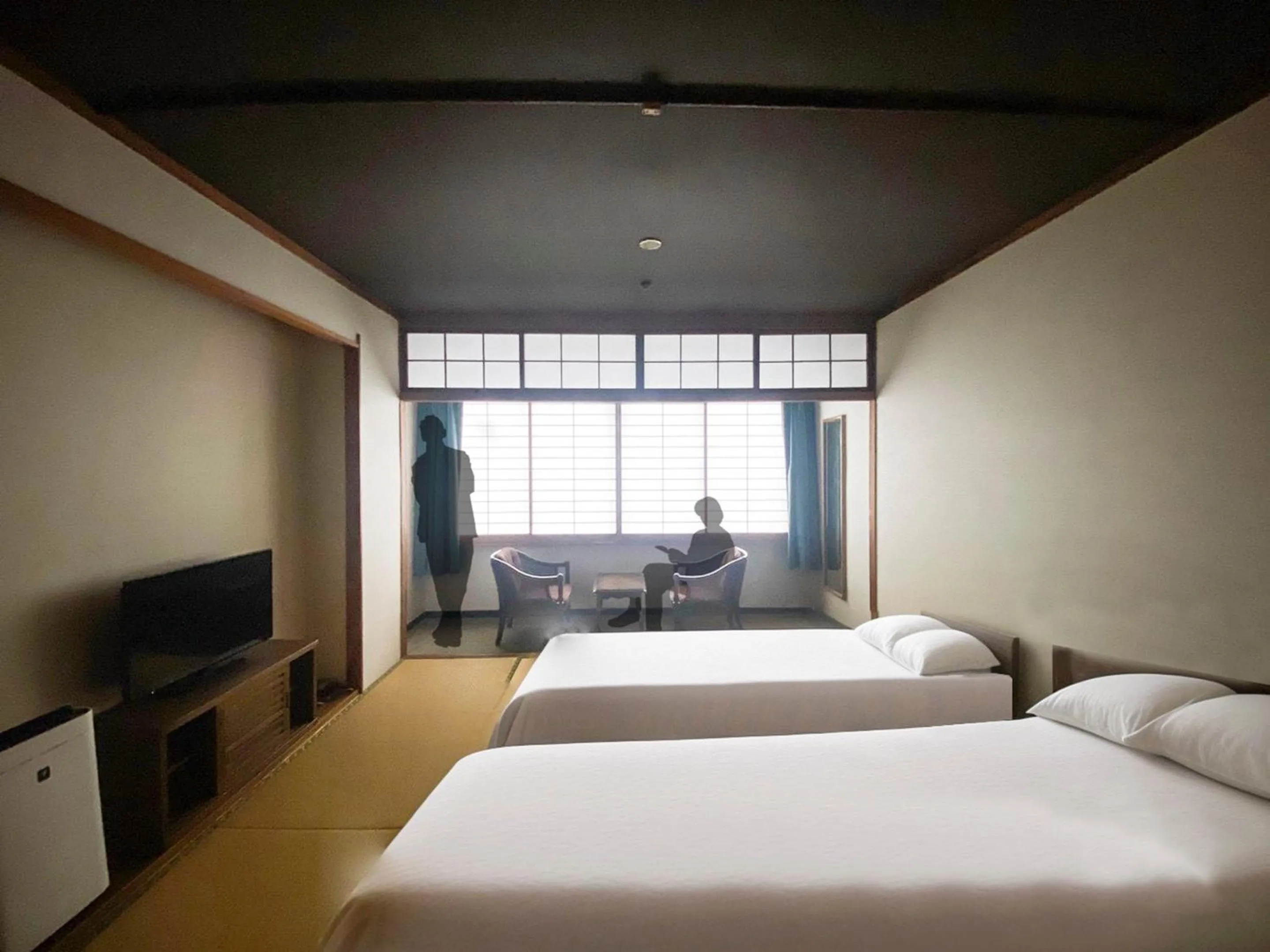 Bed in Hotel Flags Kuju Kusima