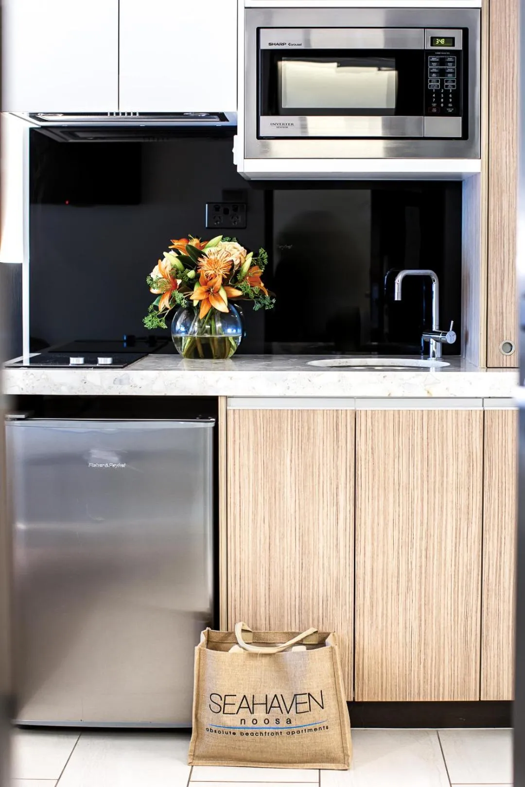 Kitchen or kitchenette in Seahaven Noosa Beachfront Resort