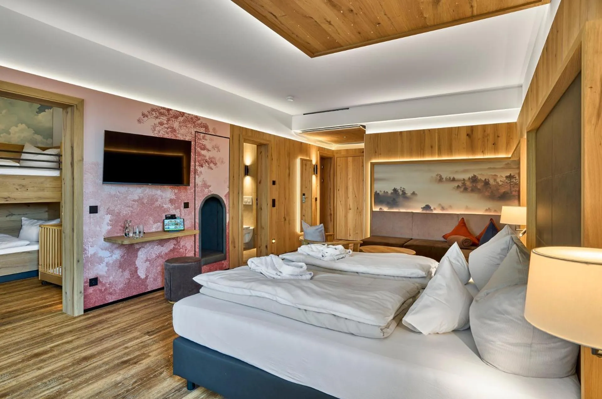 Living room, Bed in Familotel Schreinerhof