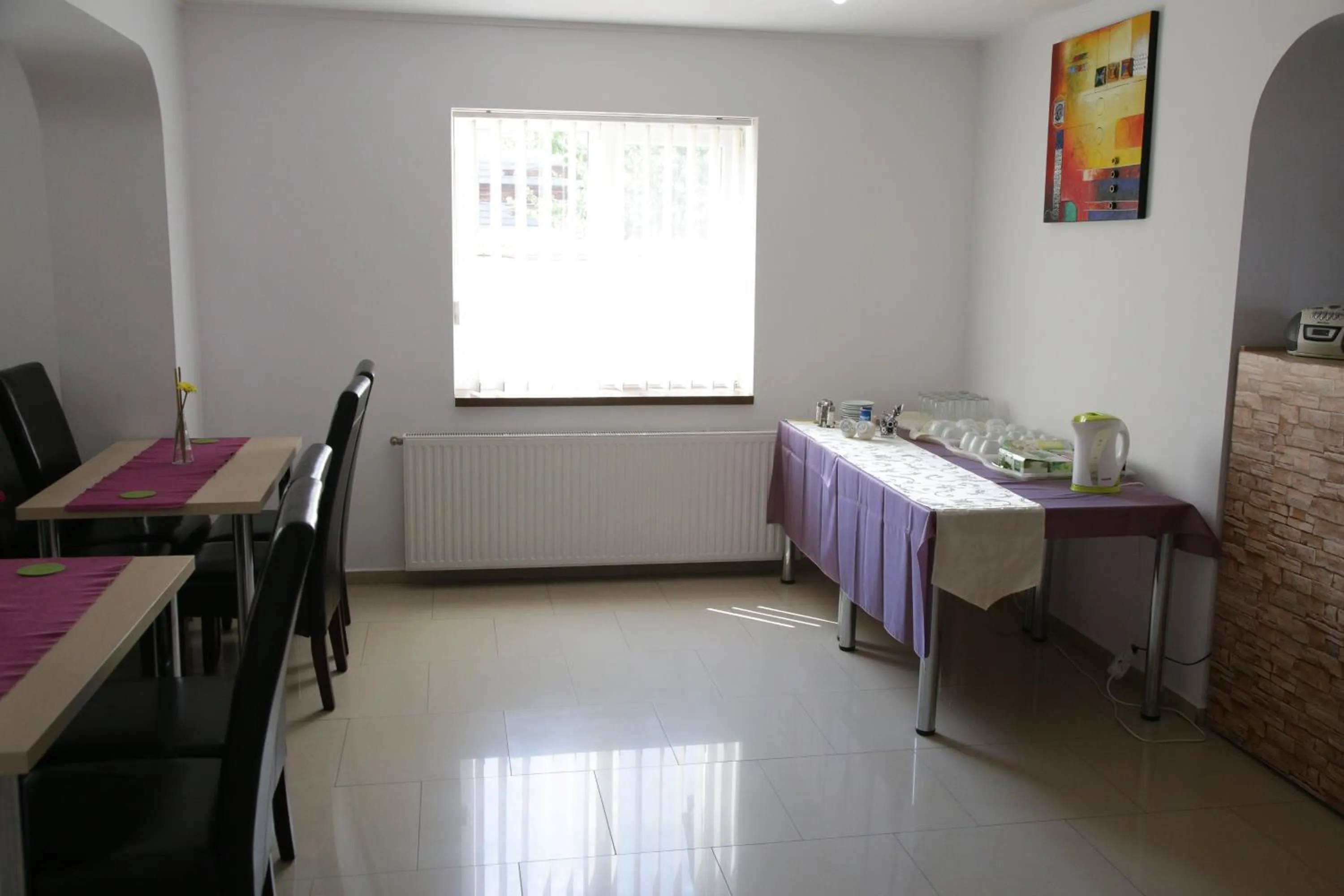 Communal lounge/ TV room in City Comfort Villa