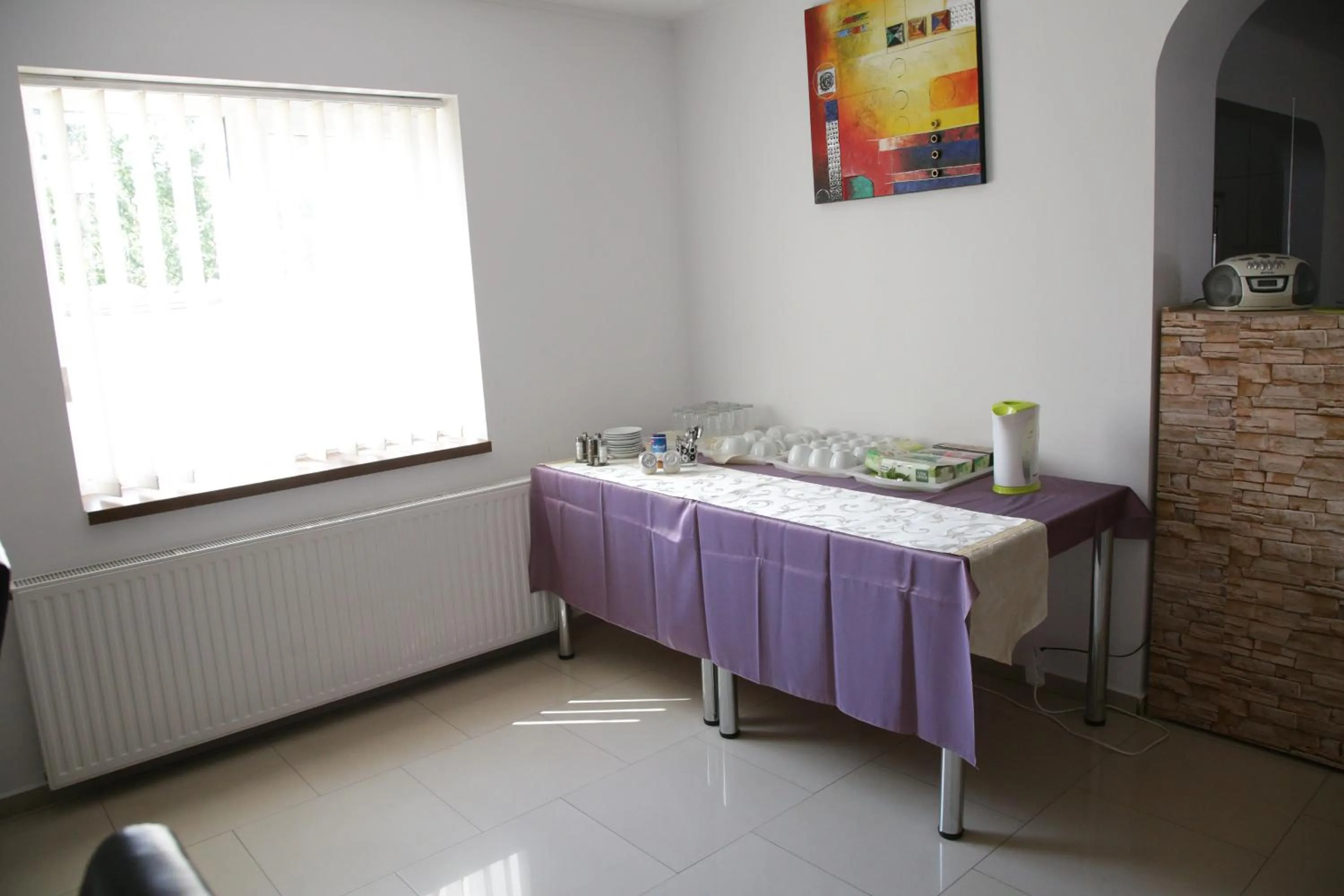 Communal lounge/ TV room in City Comfort Villa