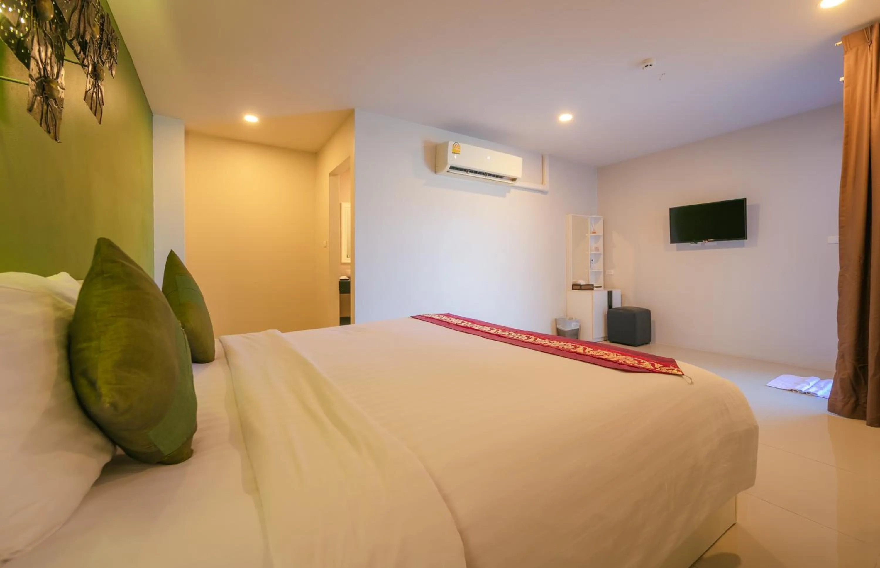 Bed in Gu Hotel Patong