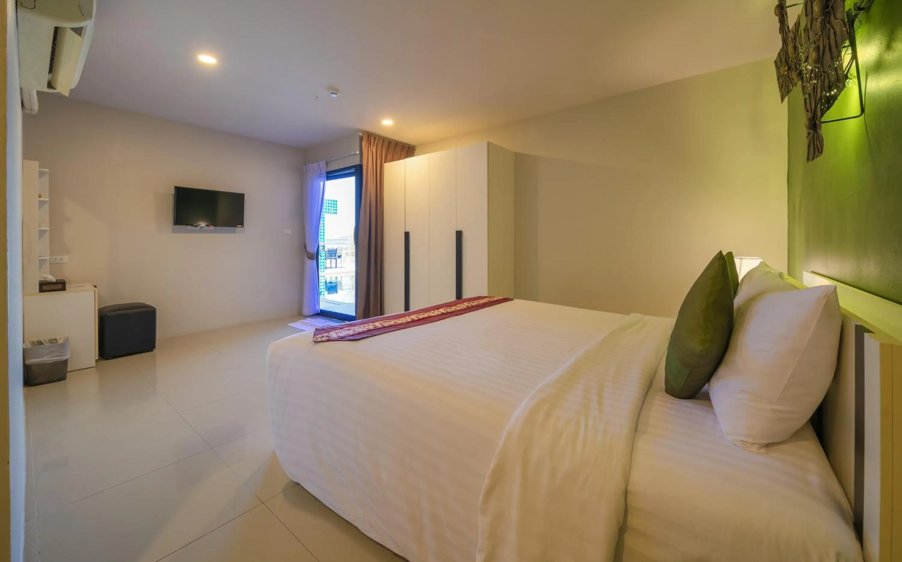 Bed in Gu Hotel Patong