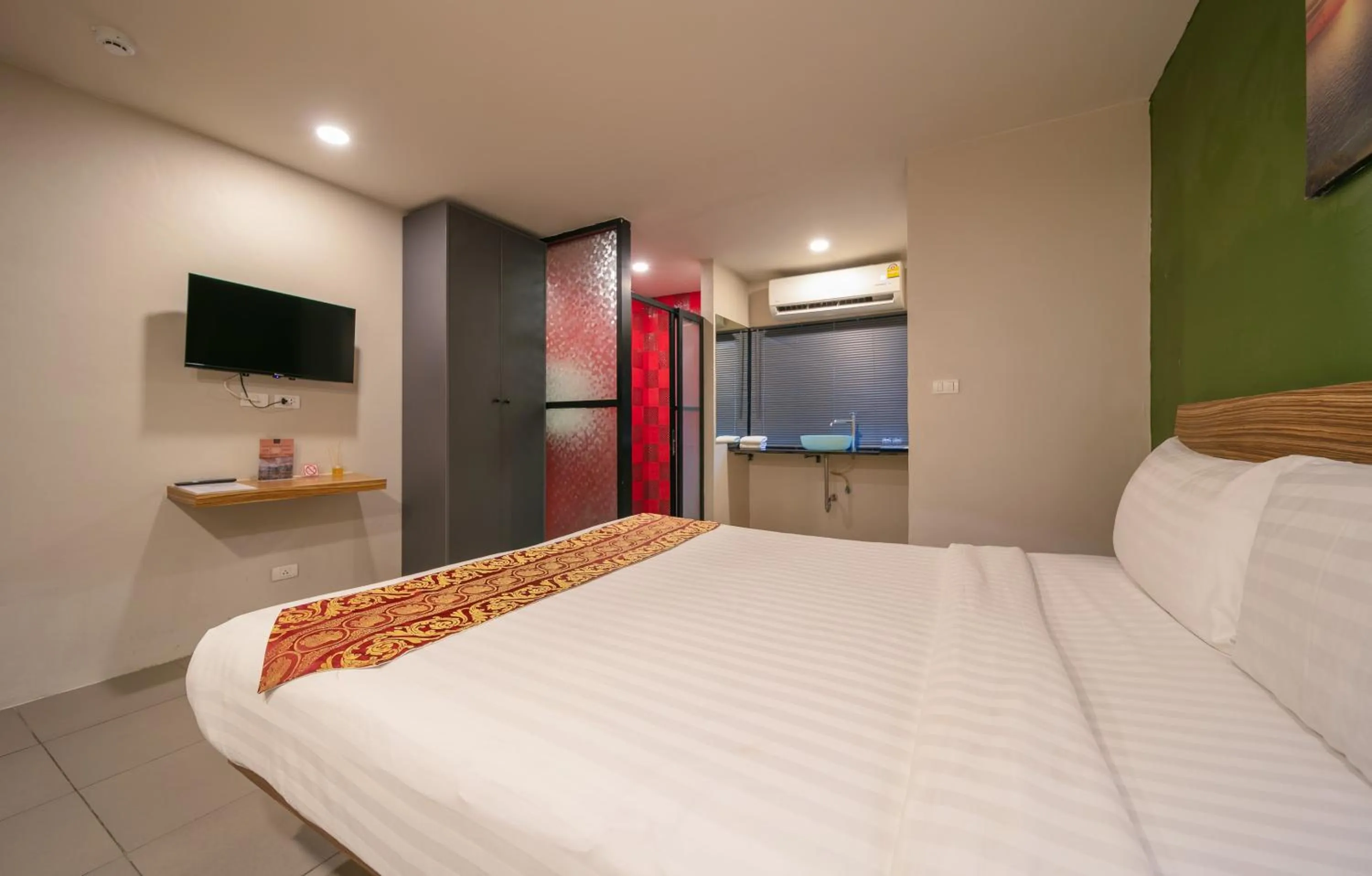 Bed in Gu Hotel Patong