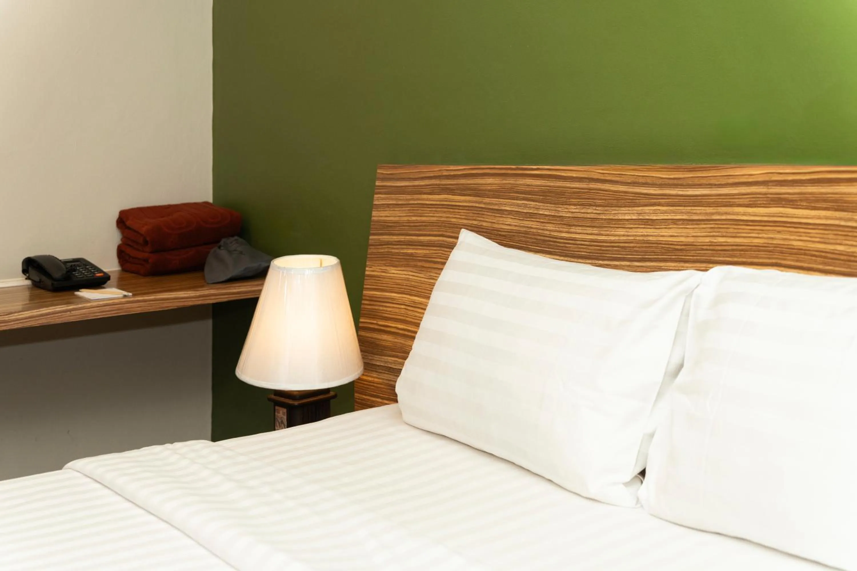 Property building, Bed in Gu Hotel Patong