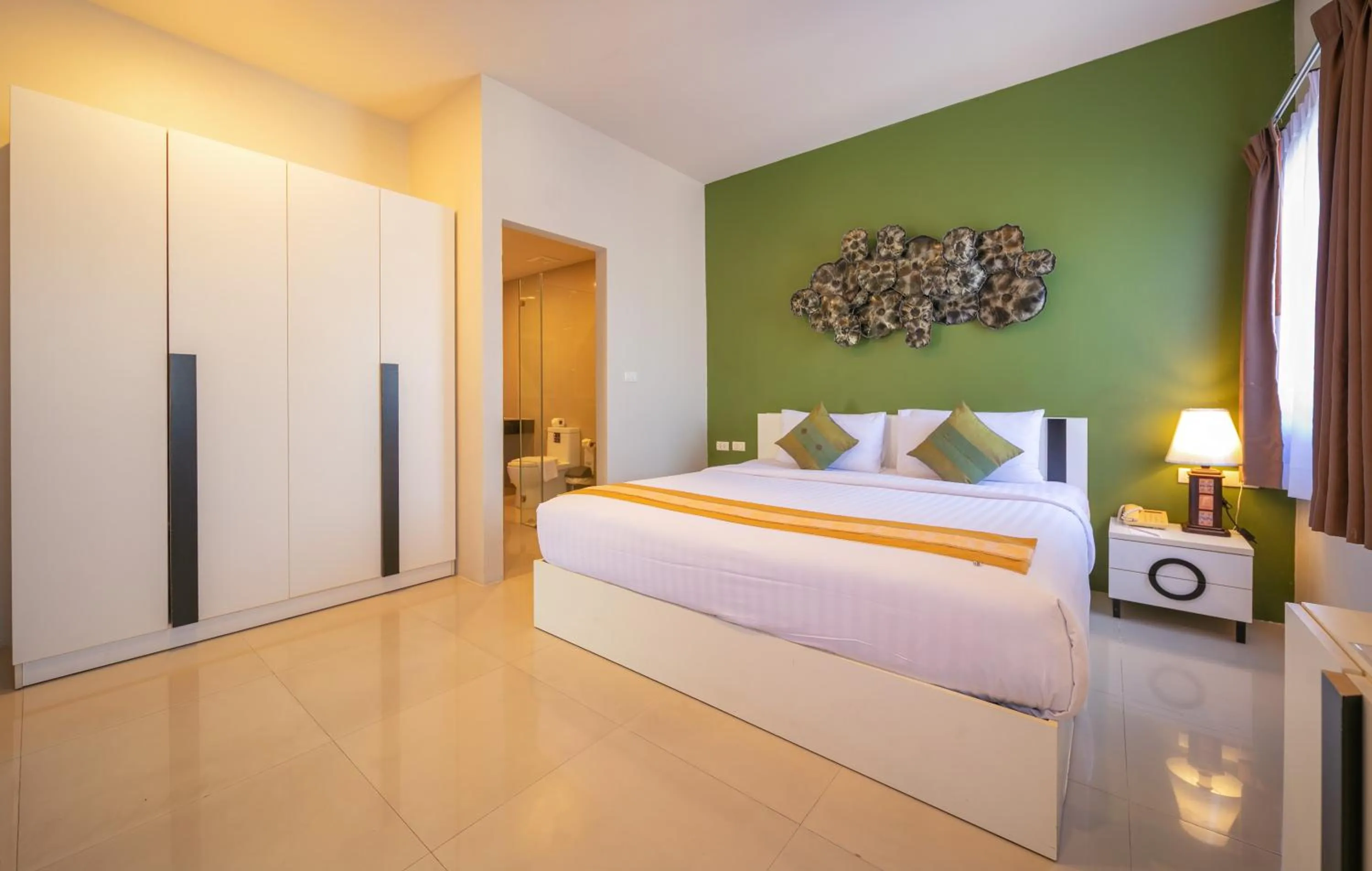 Bed in Gu Hotel Patong