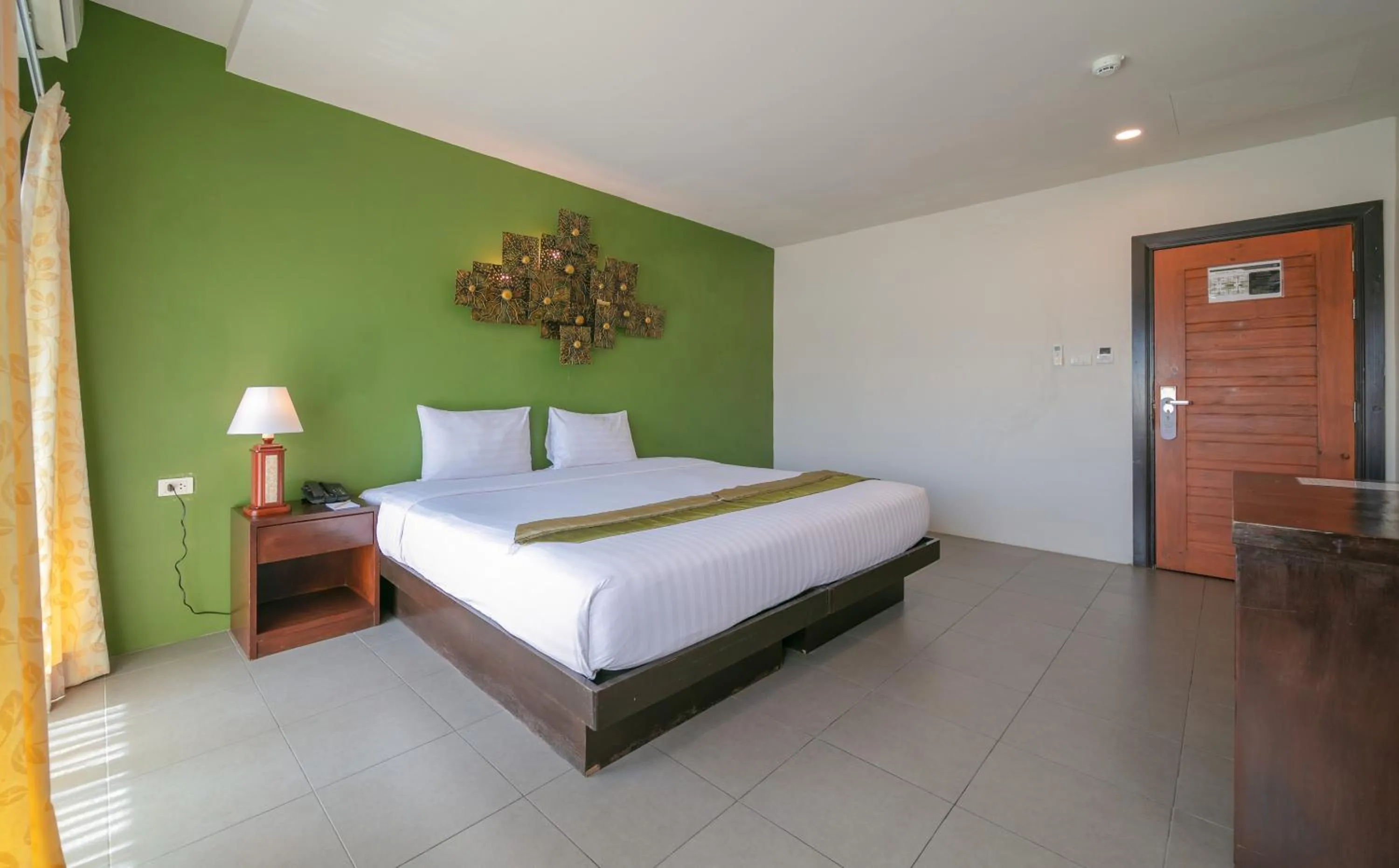 Bed in Gu Hotel Patong