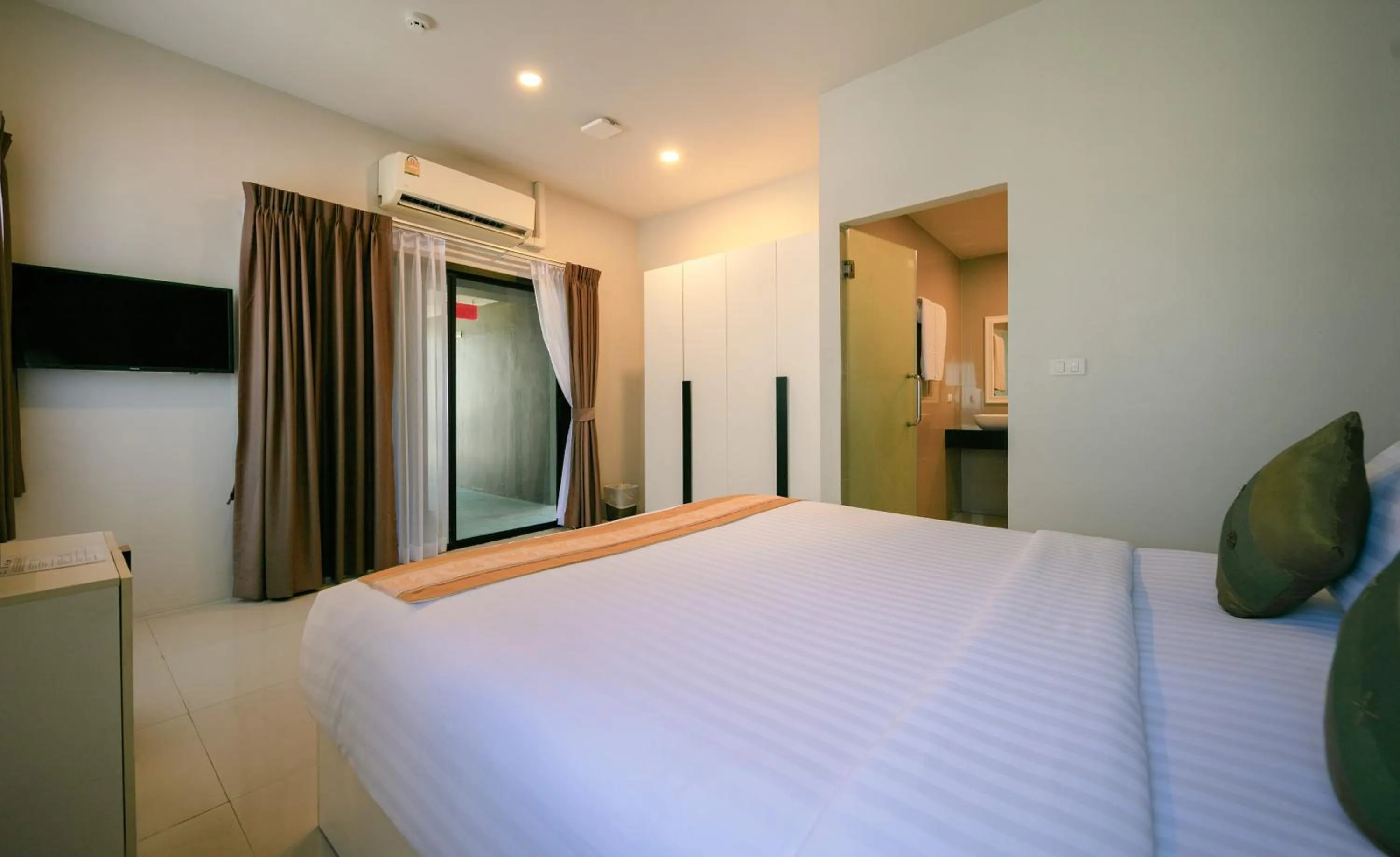 Bed in Gu Hotel Patong
