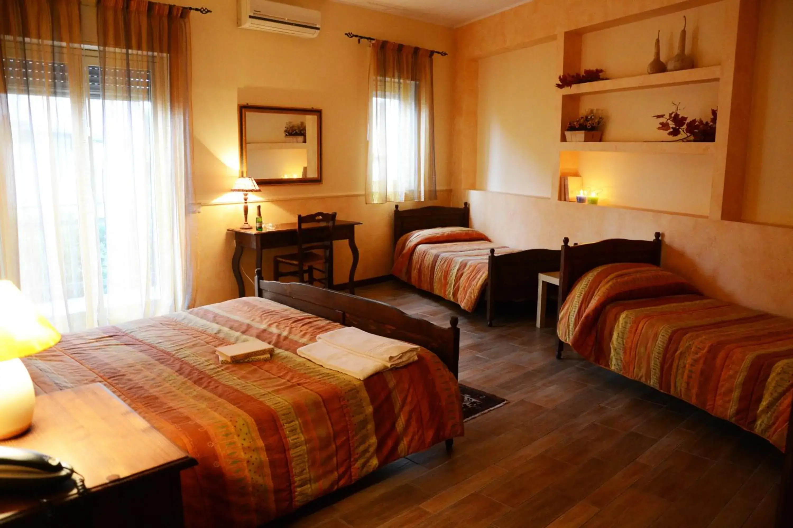 Quadruple Room - single occupancy in B&B Notti E Dintorni Quadruple Room - single occupancy in B&B Notti E Dintorni