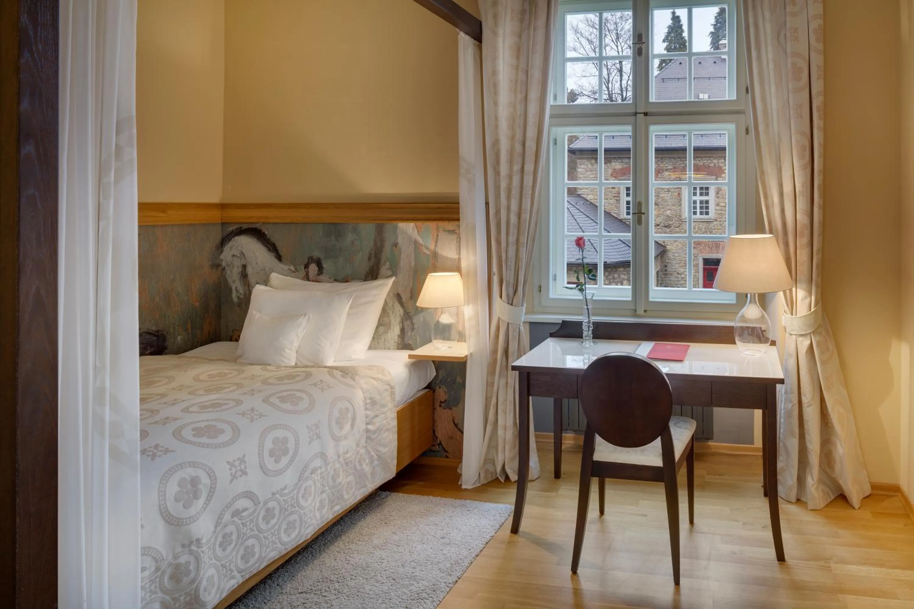 Bed in Chateau Herálec Boutique Hotel & Spa by L'Occitane