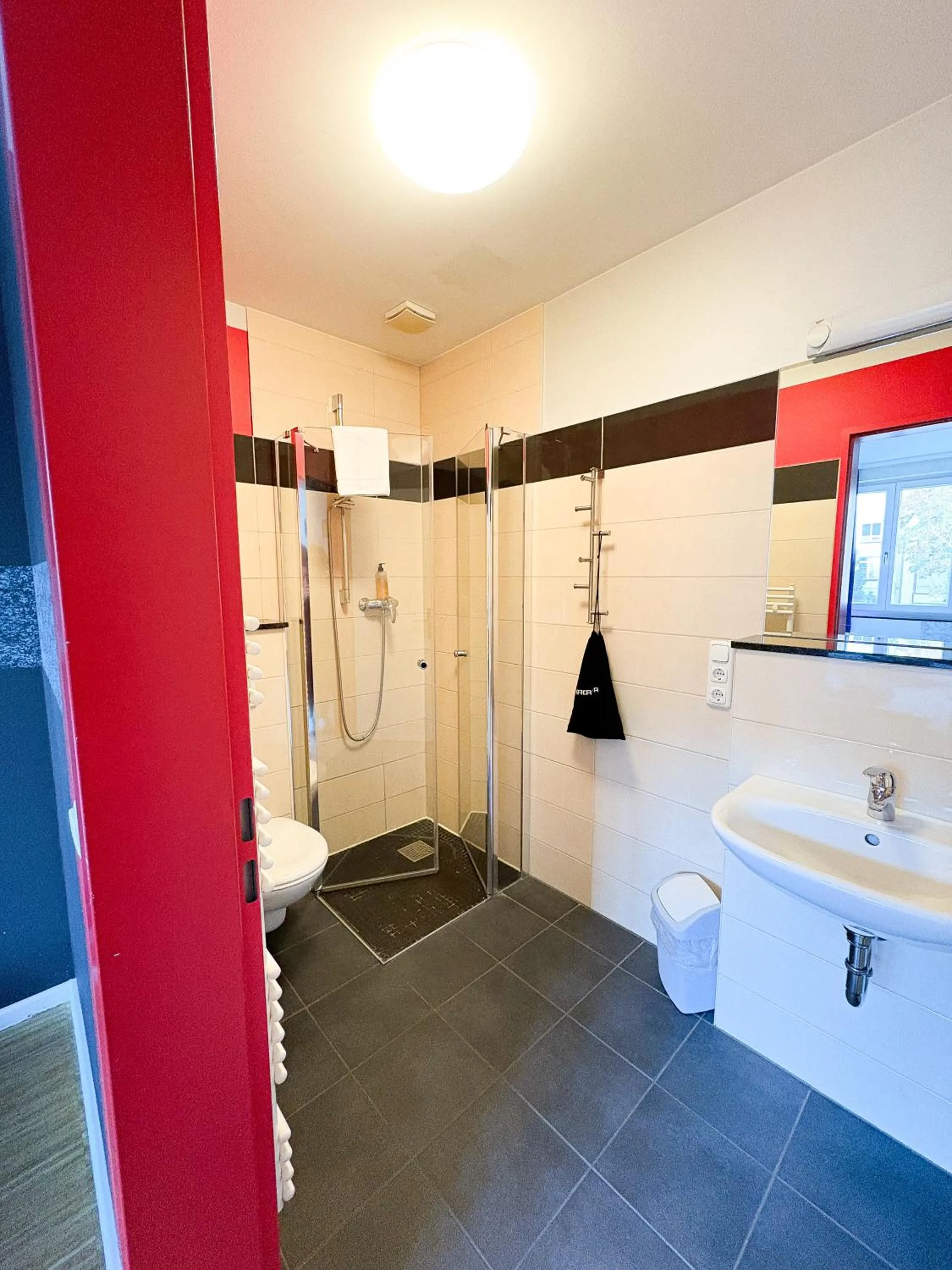 Bathroom in HOLI City Apart Hotel Berlin