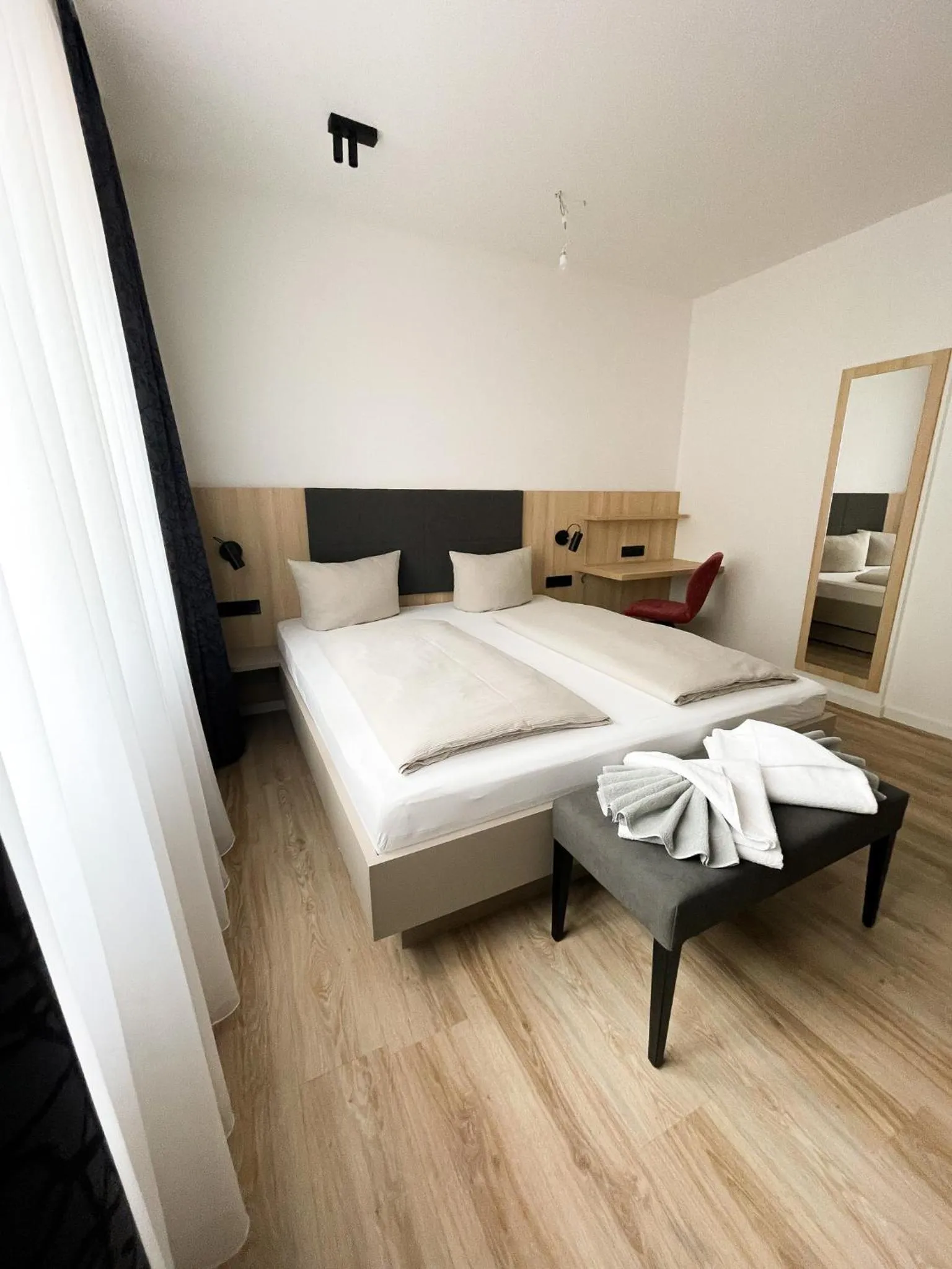 Bed in HOLI City Apart Hotel Berlin