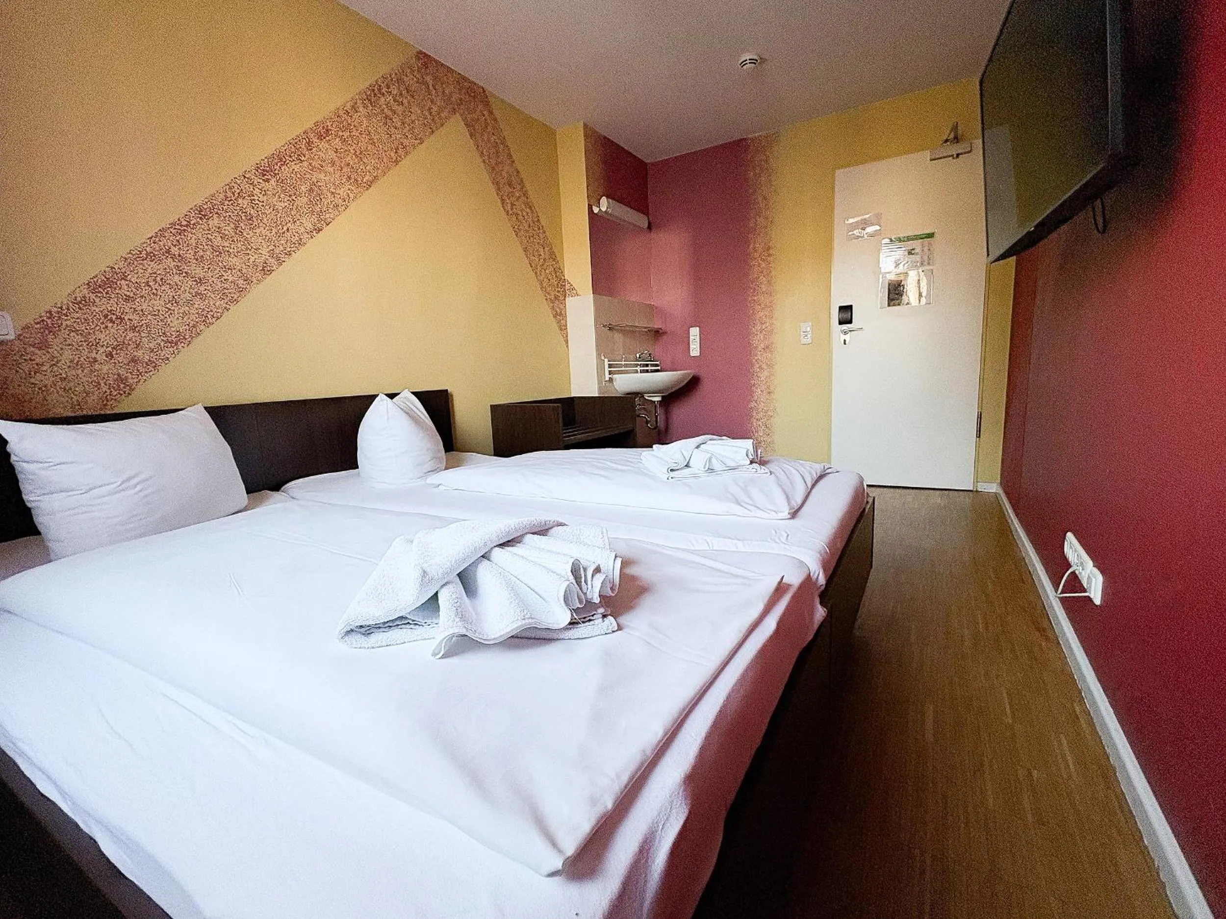 Photo of the whole room, Bed in HOLI City Apart Hotel Berlin