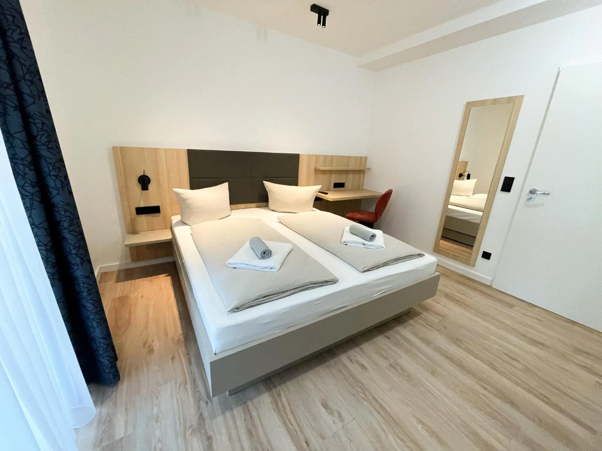 Bed in HOLI City Apart Hotel Berlin