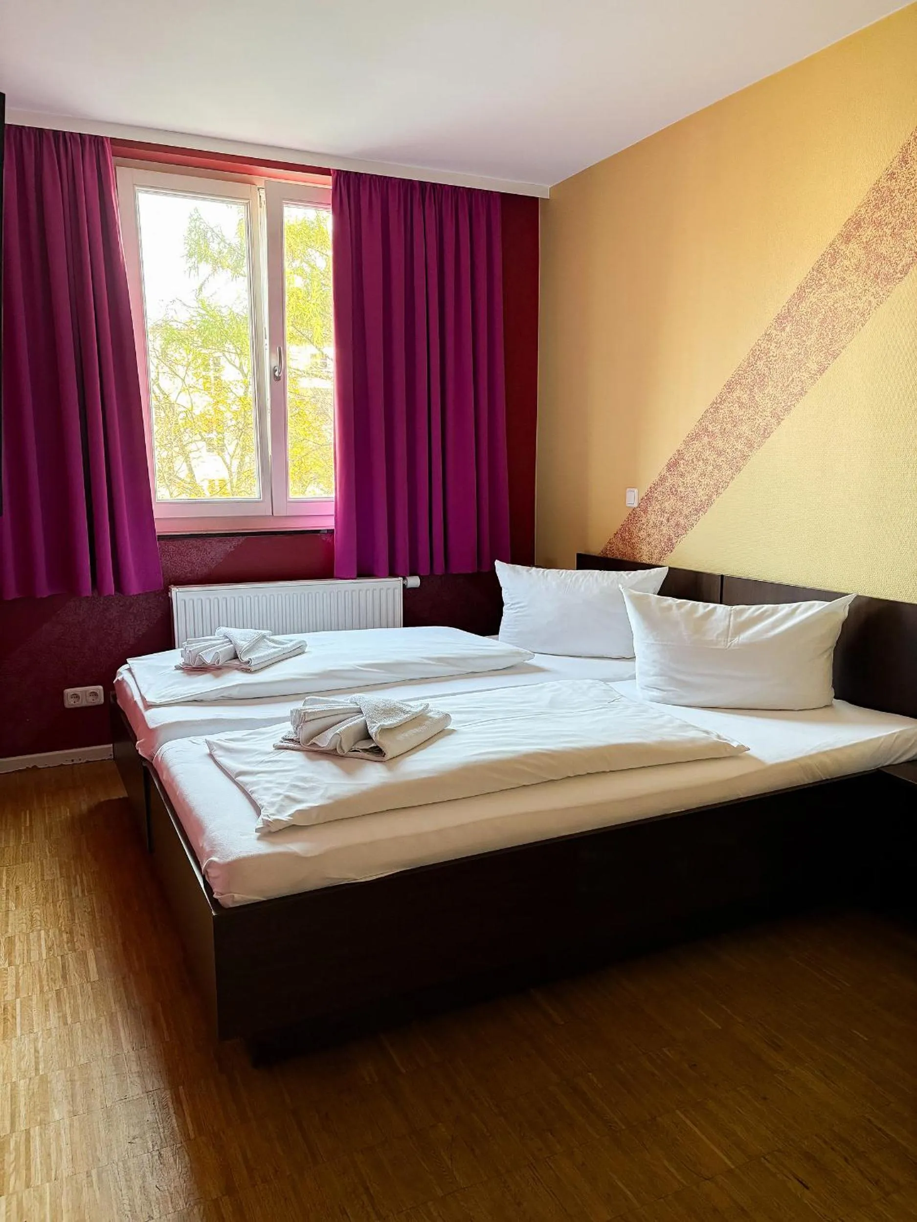 Bed in HOLI City Apart Hotel Berlin