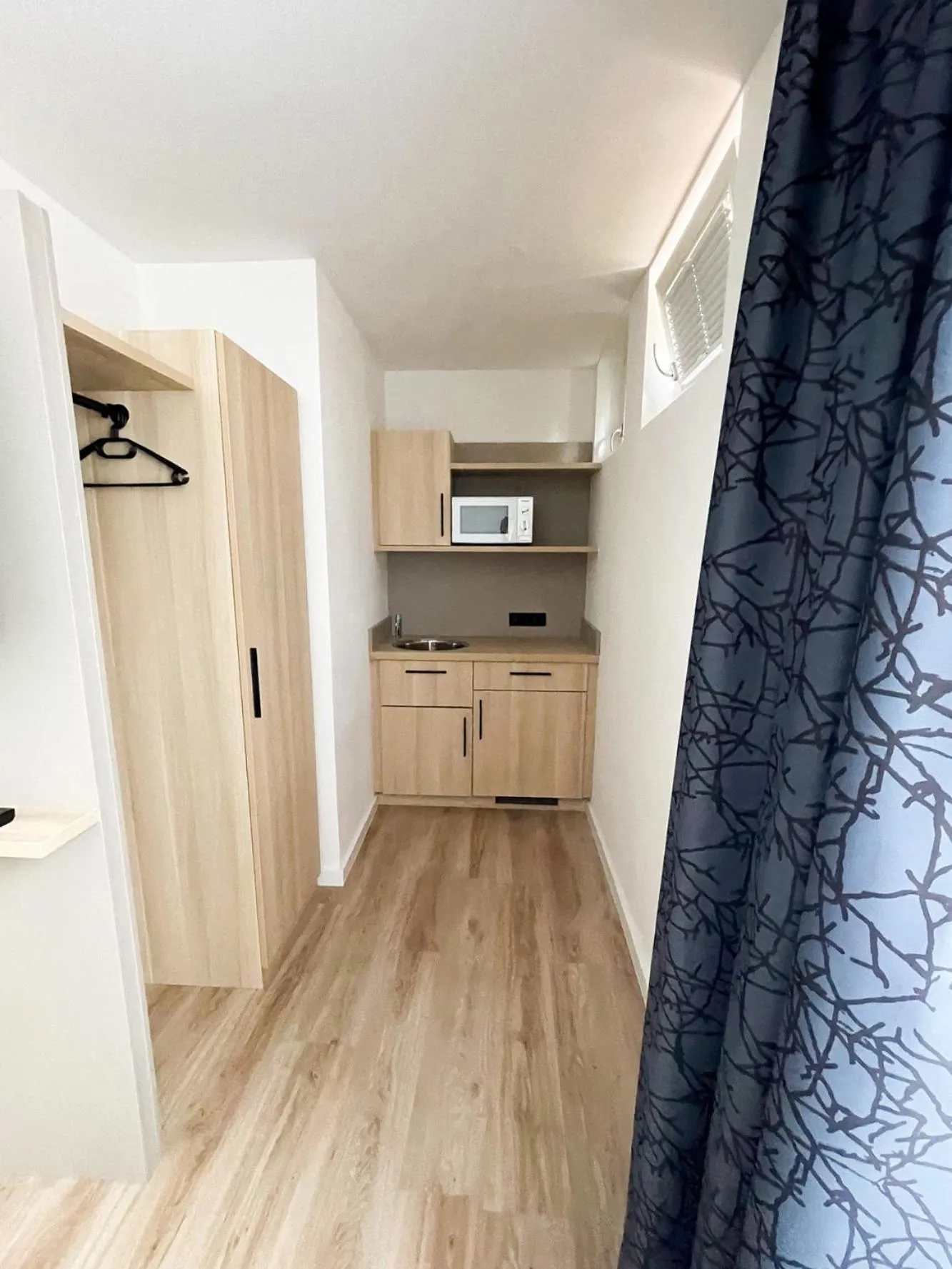 kitchen in HOLI City Apart Hotel Berlin