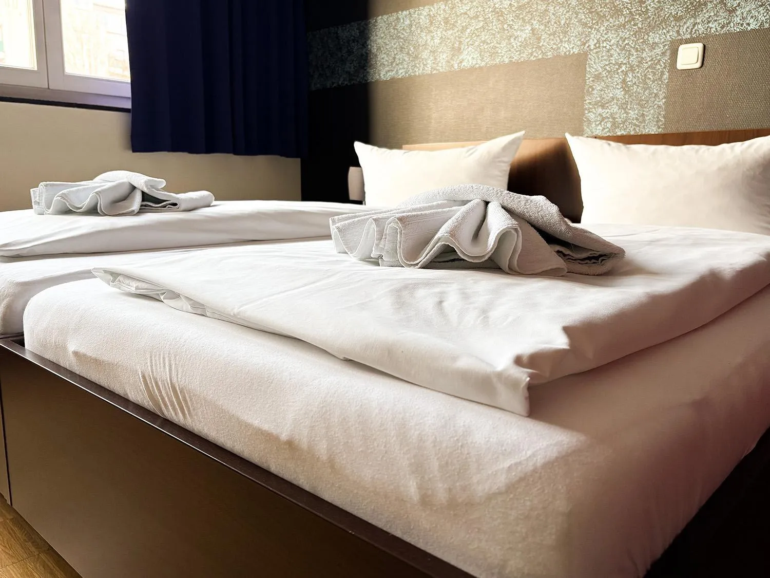 Bed in HOLI City Apart Hotel Berlin