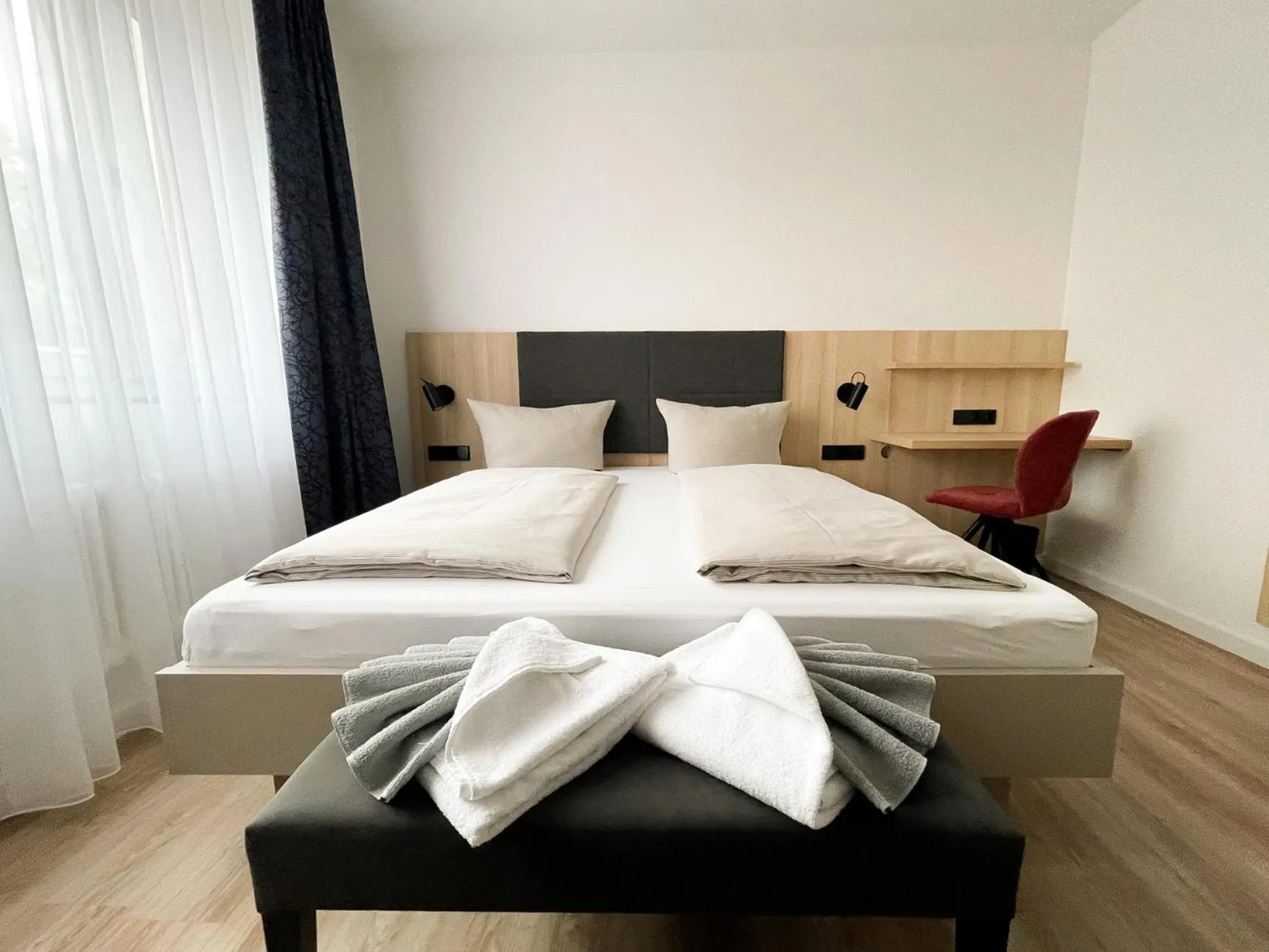 Bed in HOLI City Apart Hotel Berlin