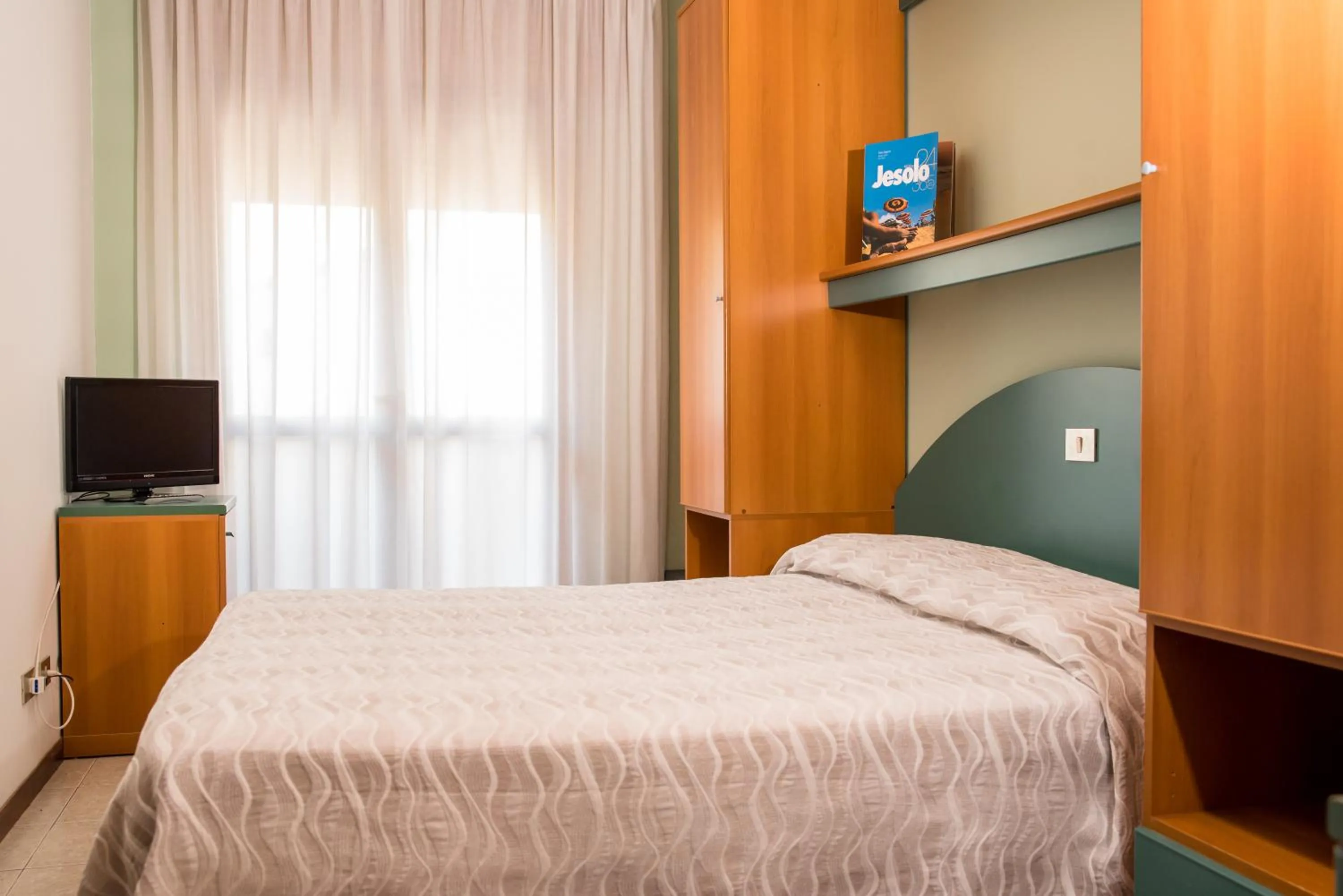 TV and multimedia, Bed in Albergo Ridente