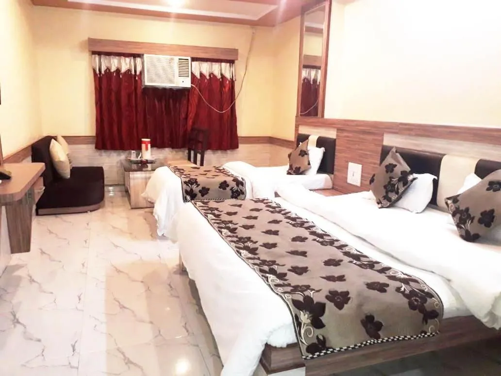 Bed in Hotel Metro Inn