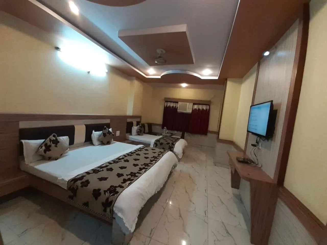 Bed in Hotel Metro Inn