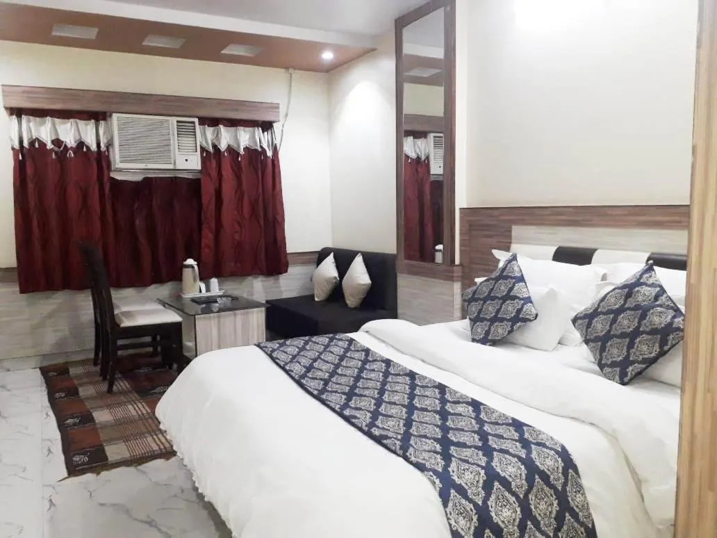 Bed in Hotel Metro Inn