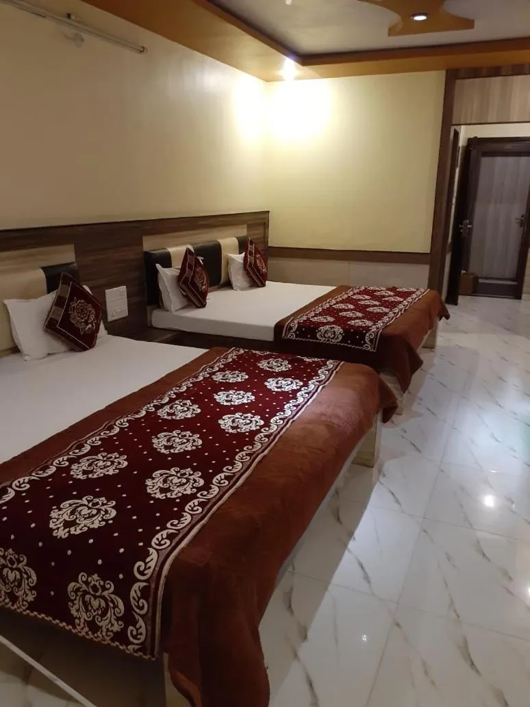 Bed in Hotel Metro Inn