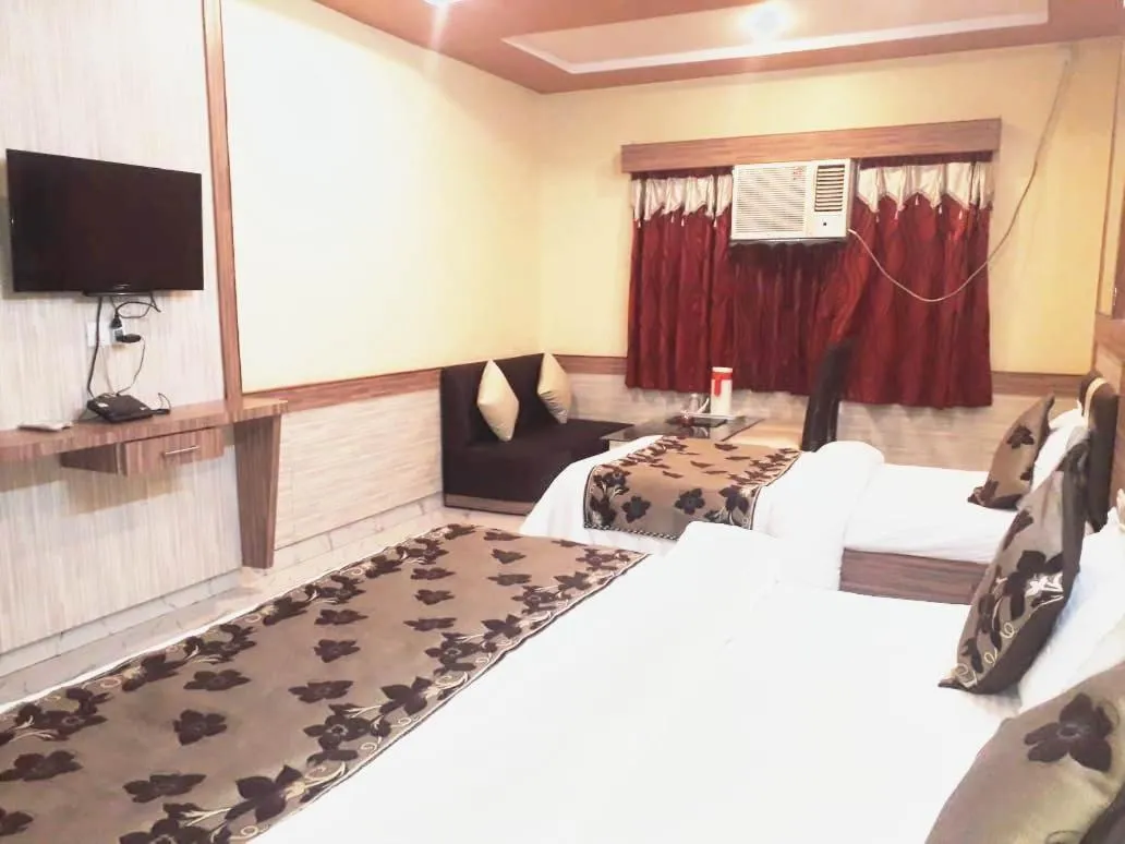 Bed in Hotel Metro Inn