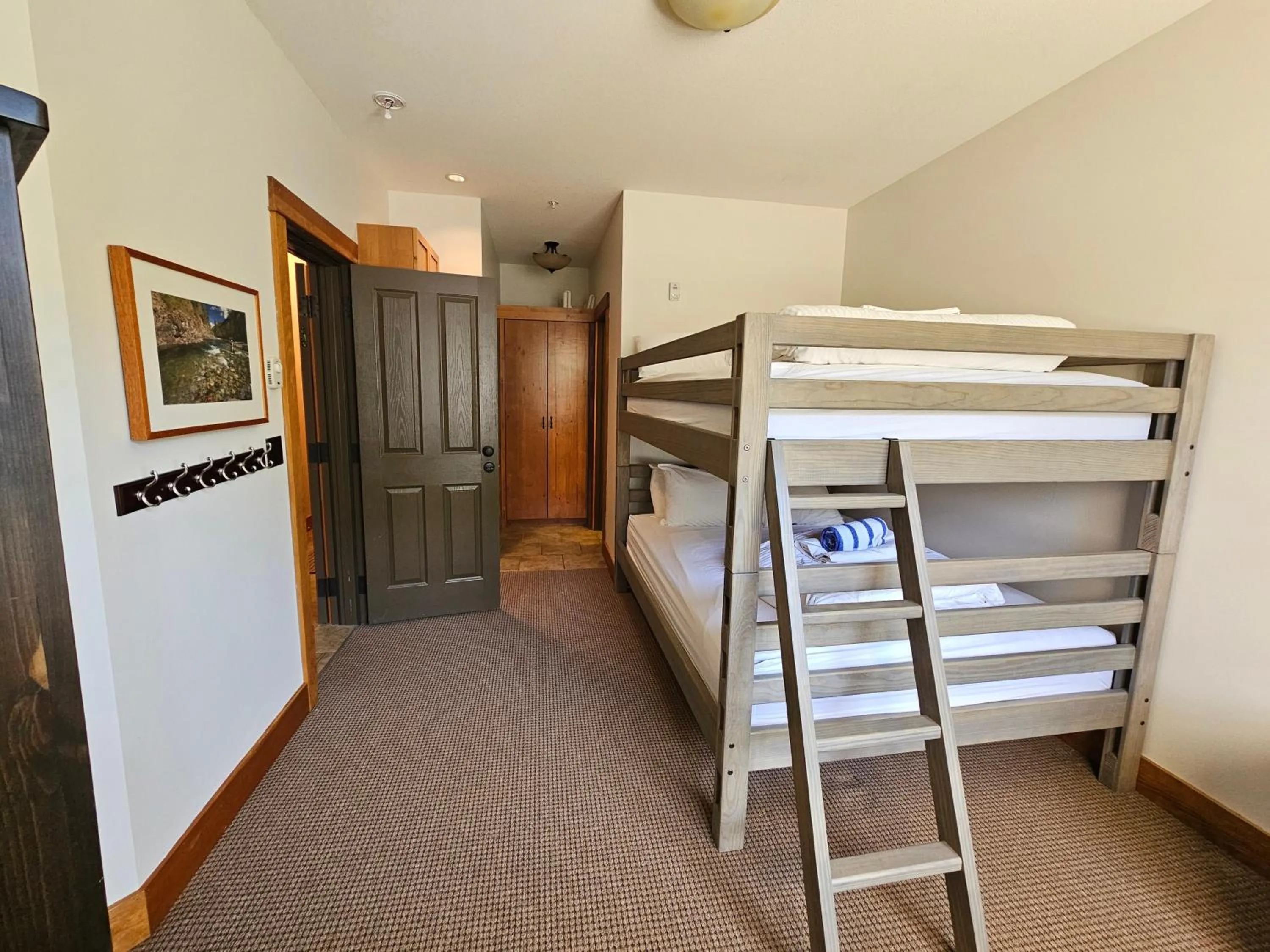 Bed in Timberline Lodges by Fernie Lodging Co