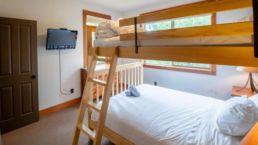 Bed in Timberline Lodges by Fernie Lodging Co