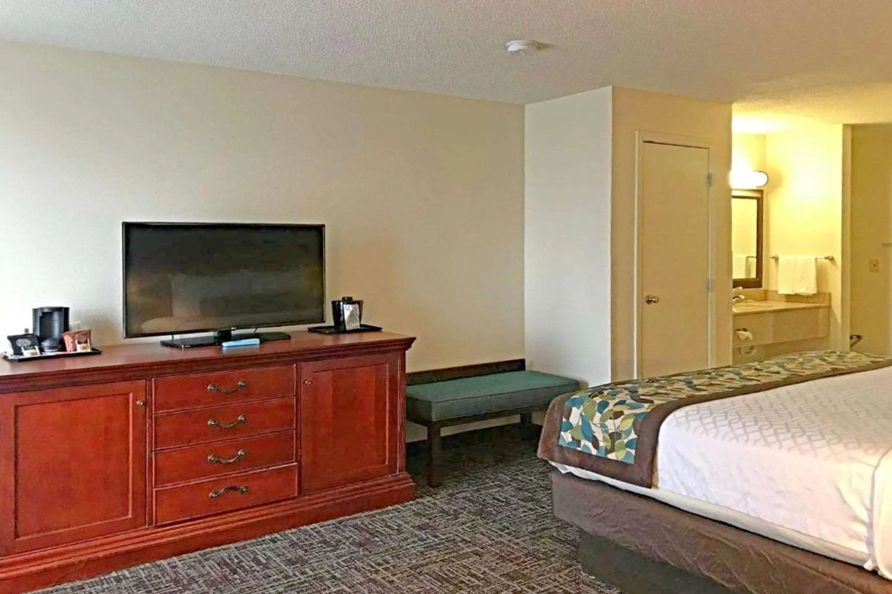 Bedroom in Rodeway Inn & Suites