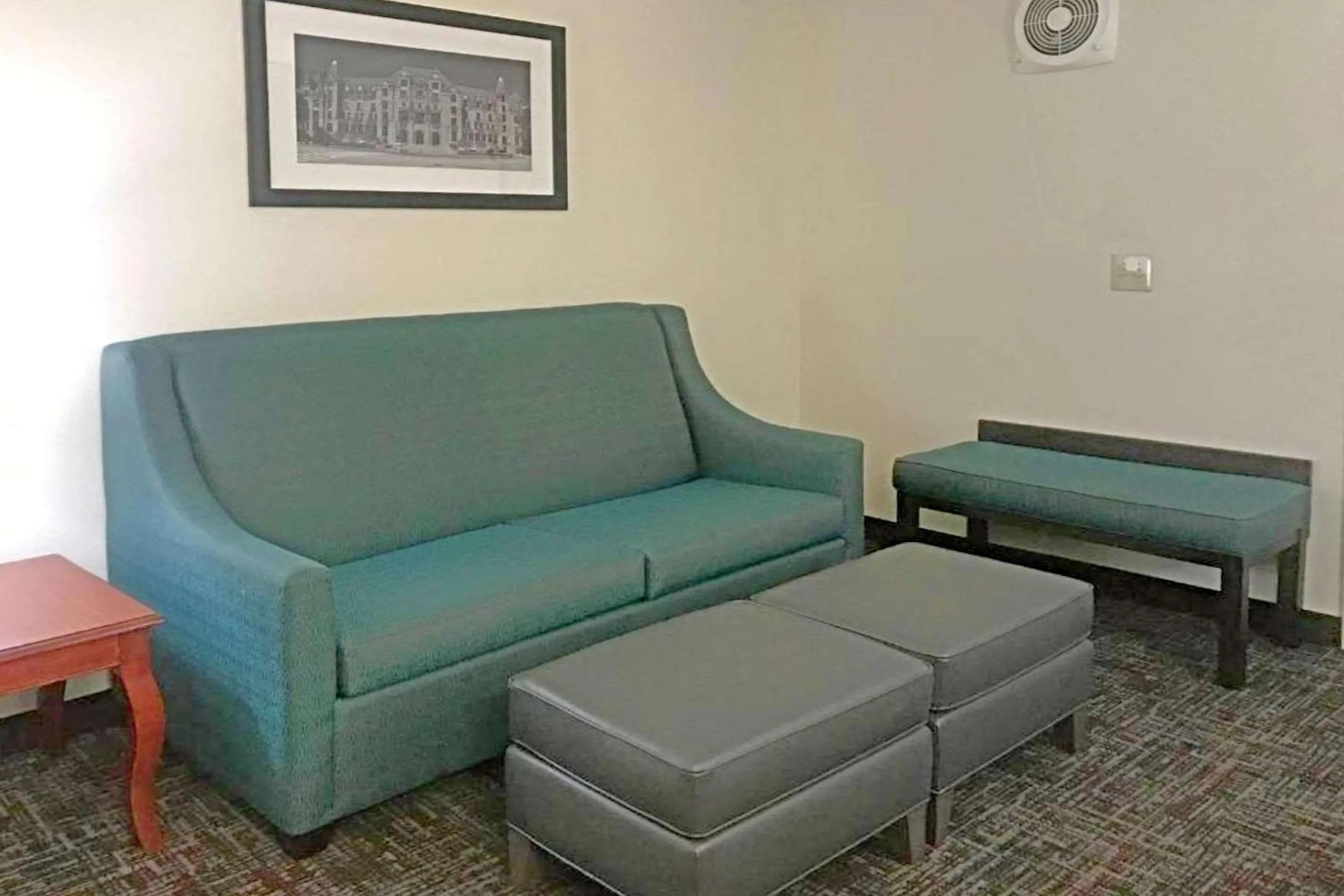 Bedroom in Rodeway Inn & Suites