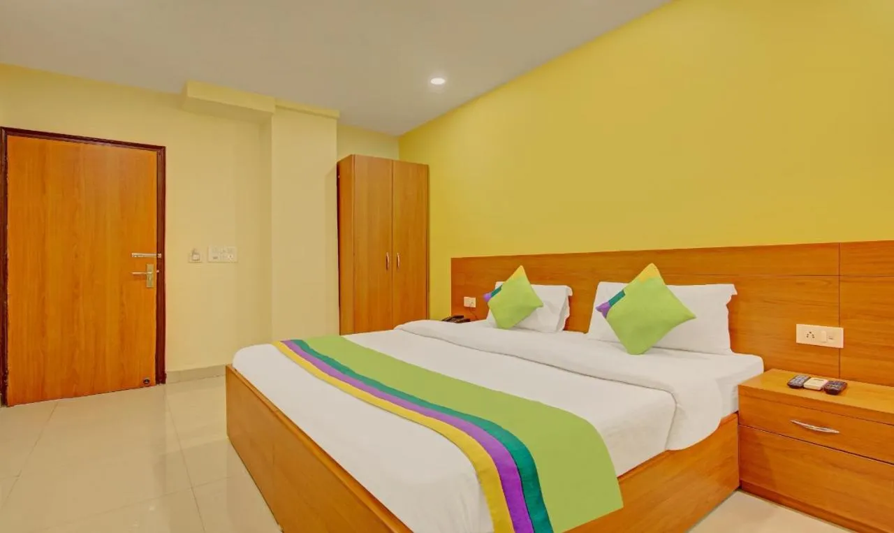 Bed in Hotel TMS Residency