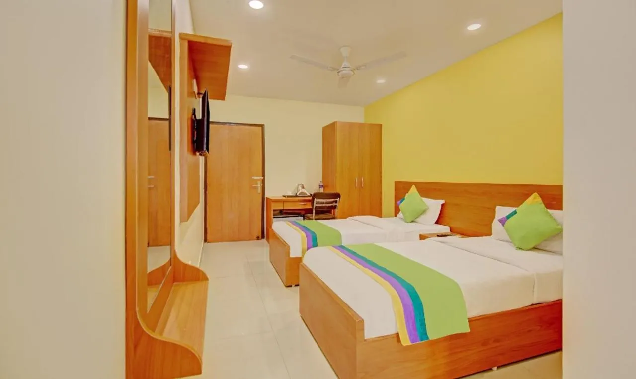 Bed in Hotel TMS Residency