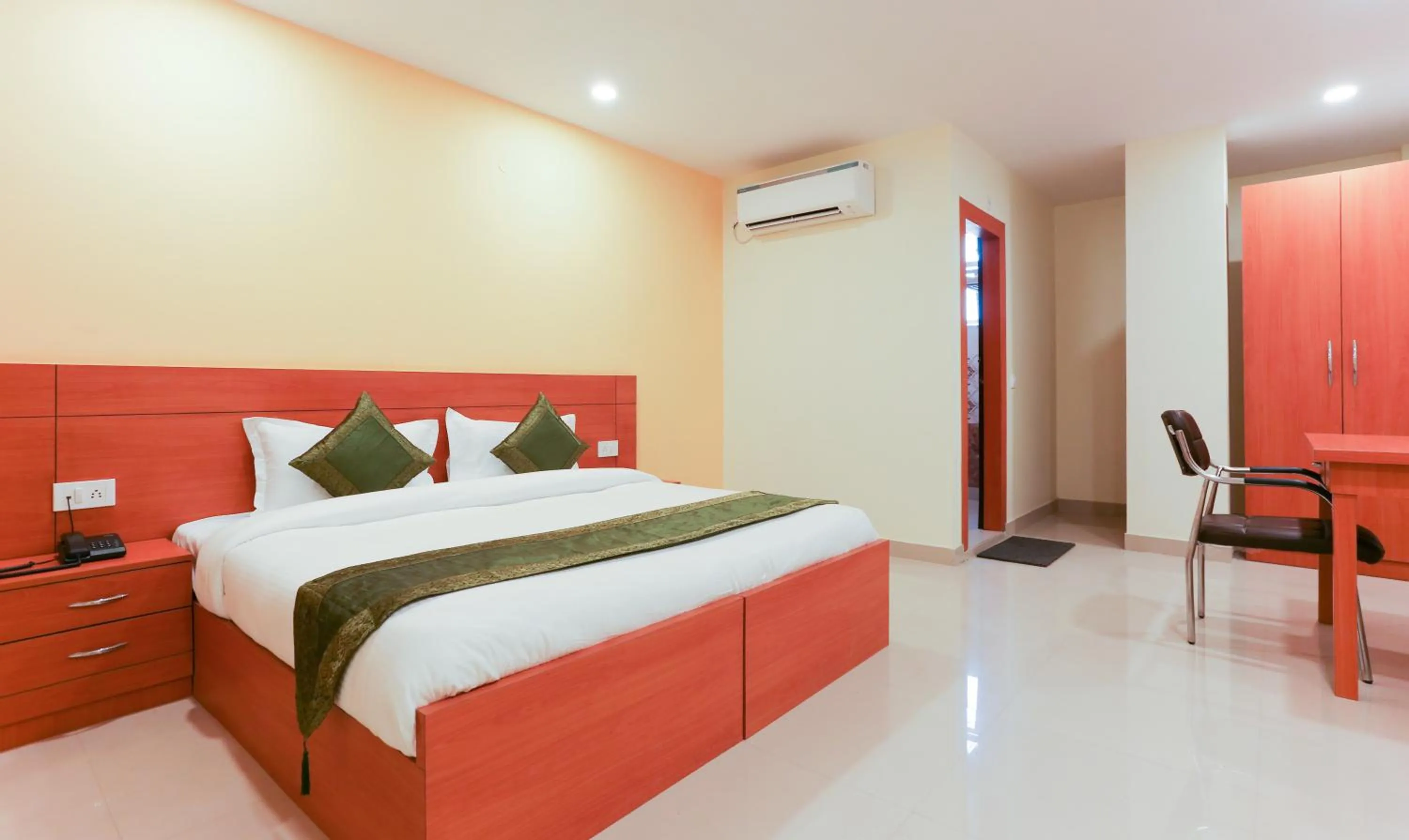 Bed in Hotel TMS Residency