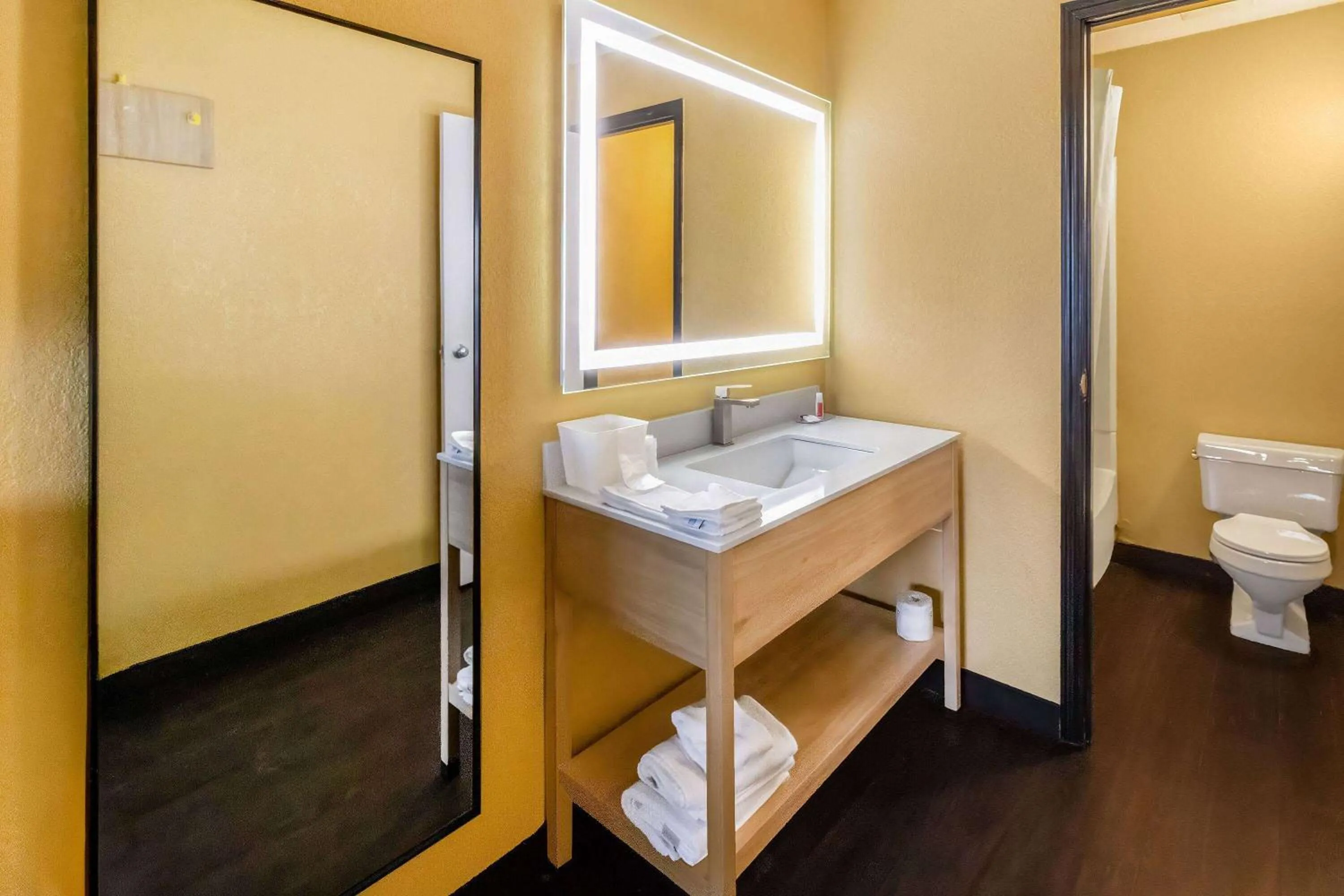 Bathroom in Super 8 by Wyndham Vandalia/Dayton International Airport