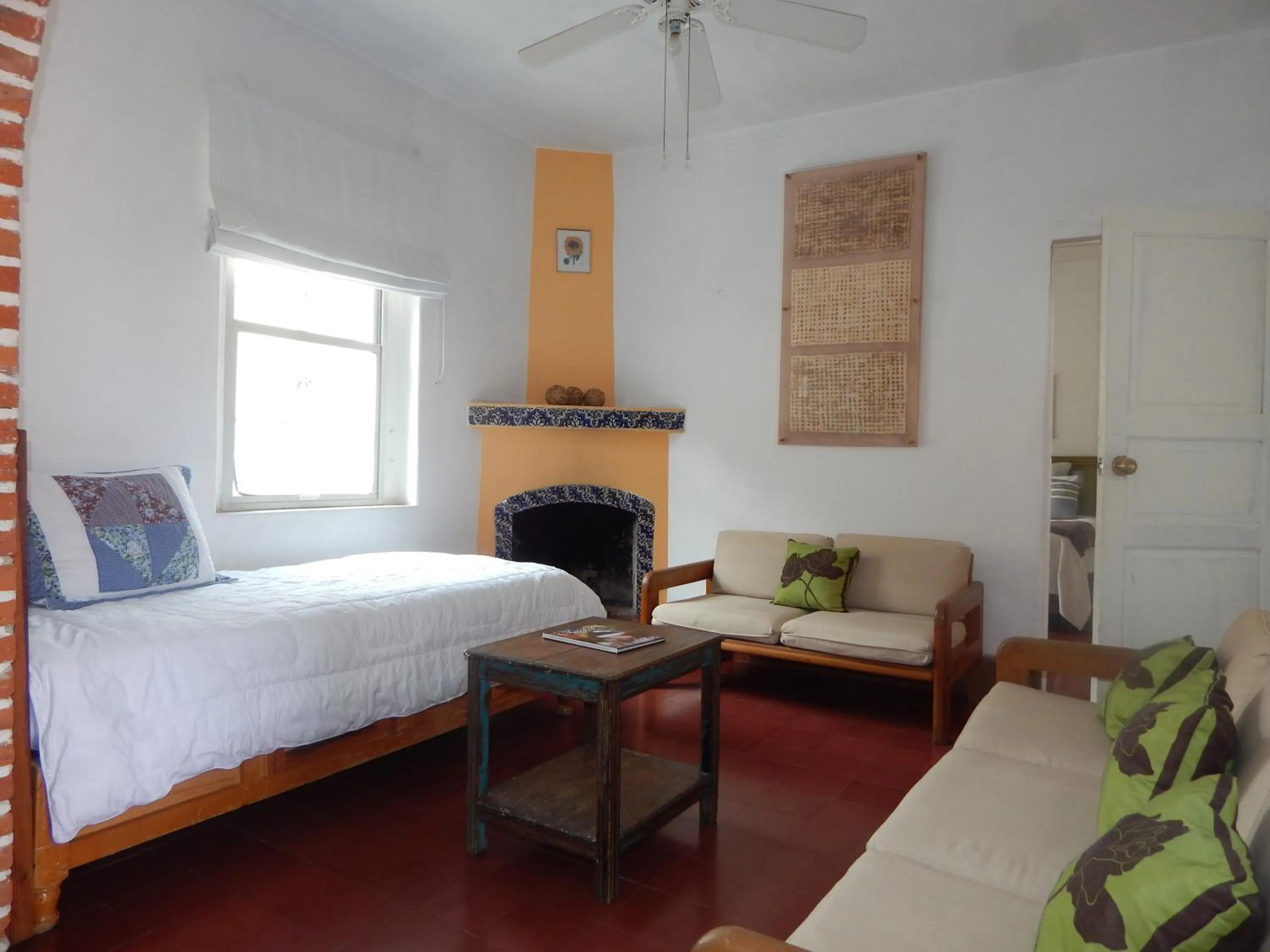 Living room, Bed in Suites Santo Domingo