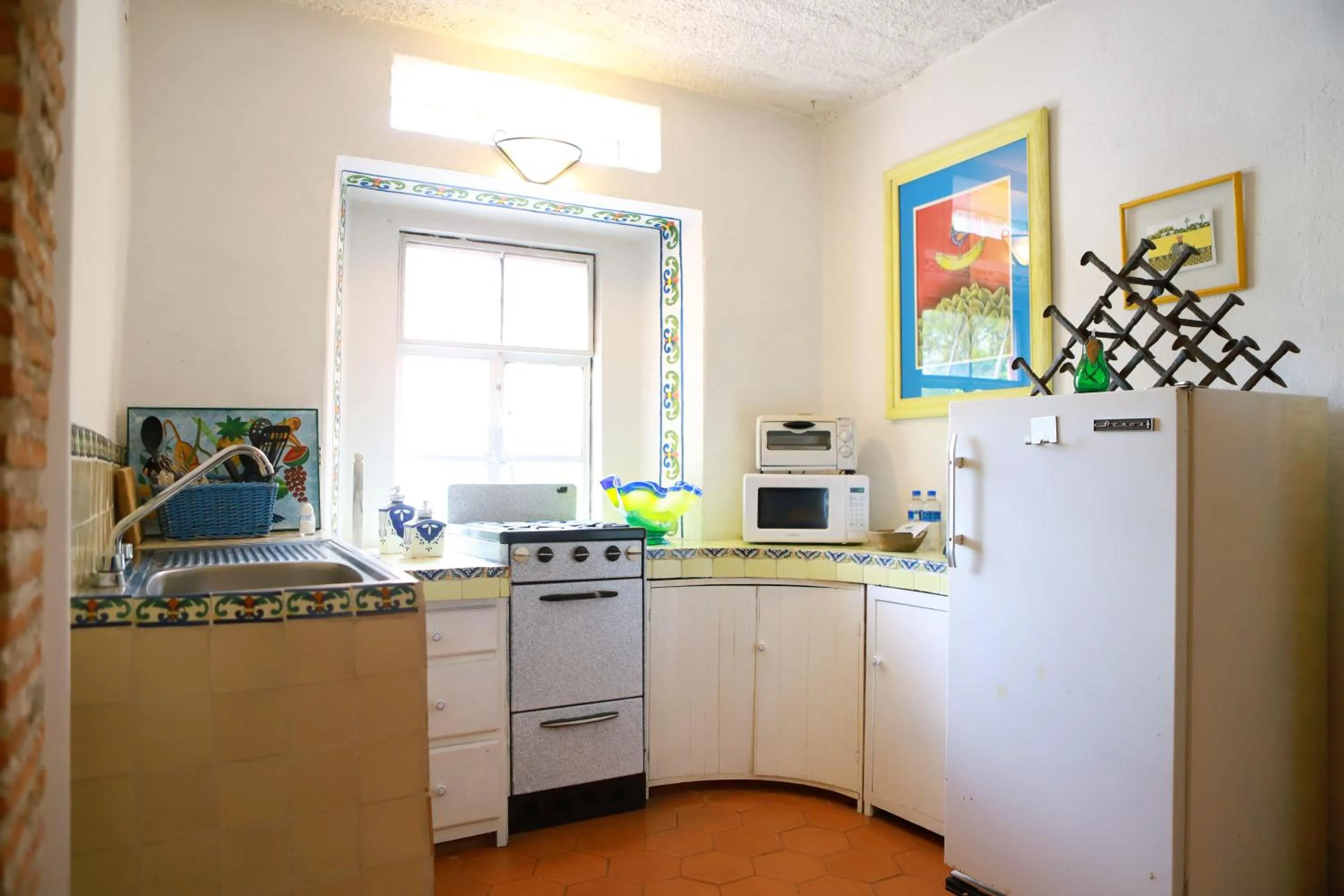 Kitchen or kitchenette in Suites Santo Domingo