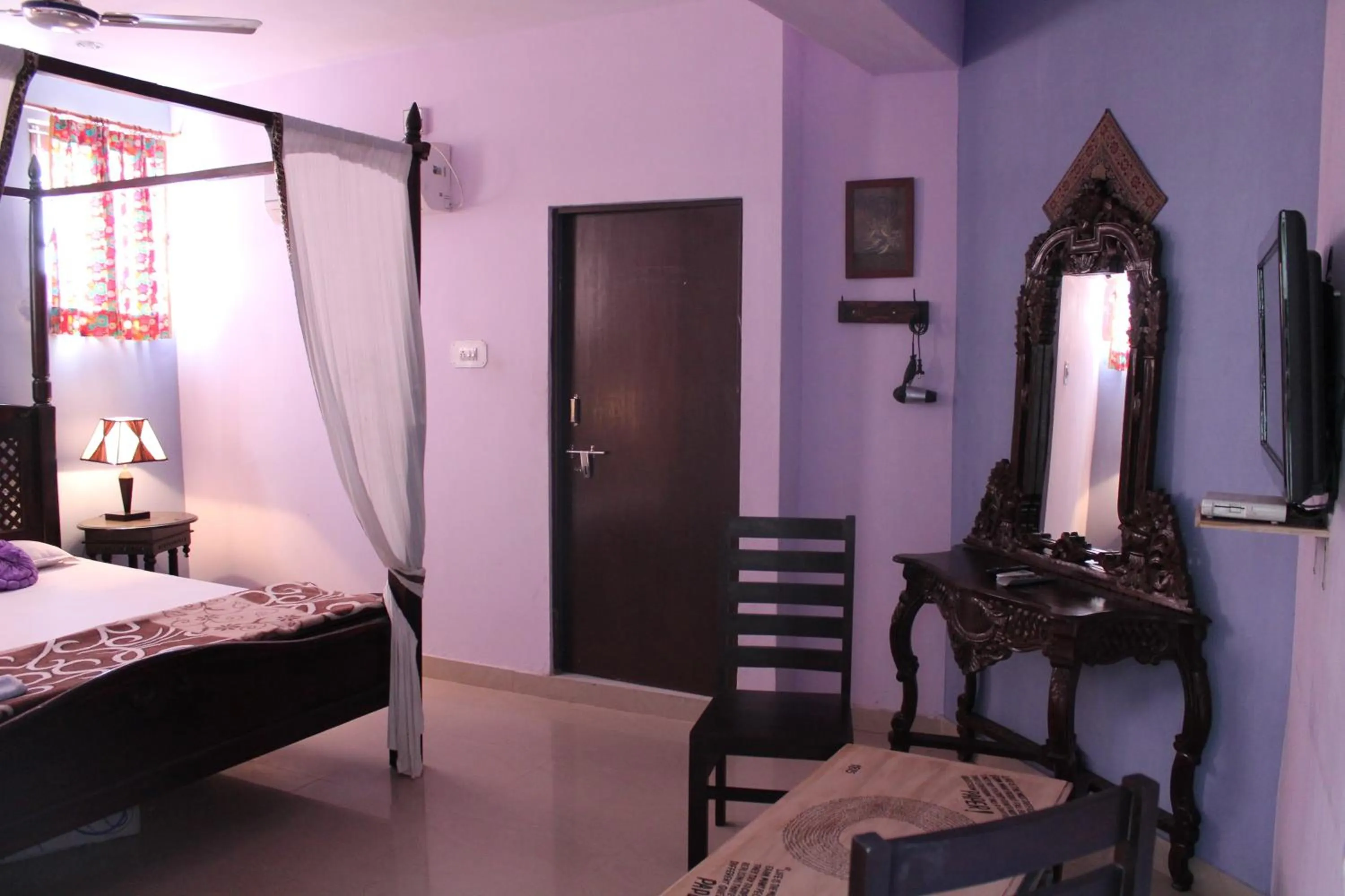 Bed in Kesar Heritage Boutique Home Stay