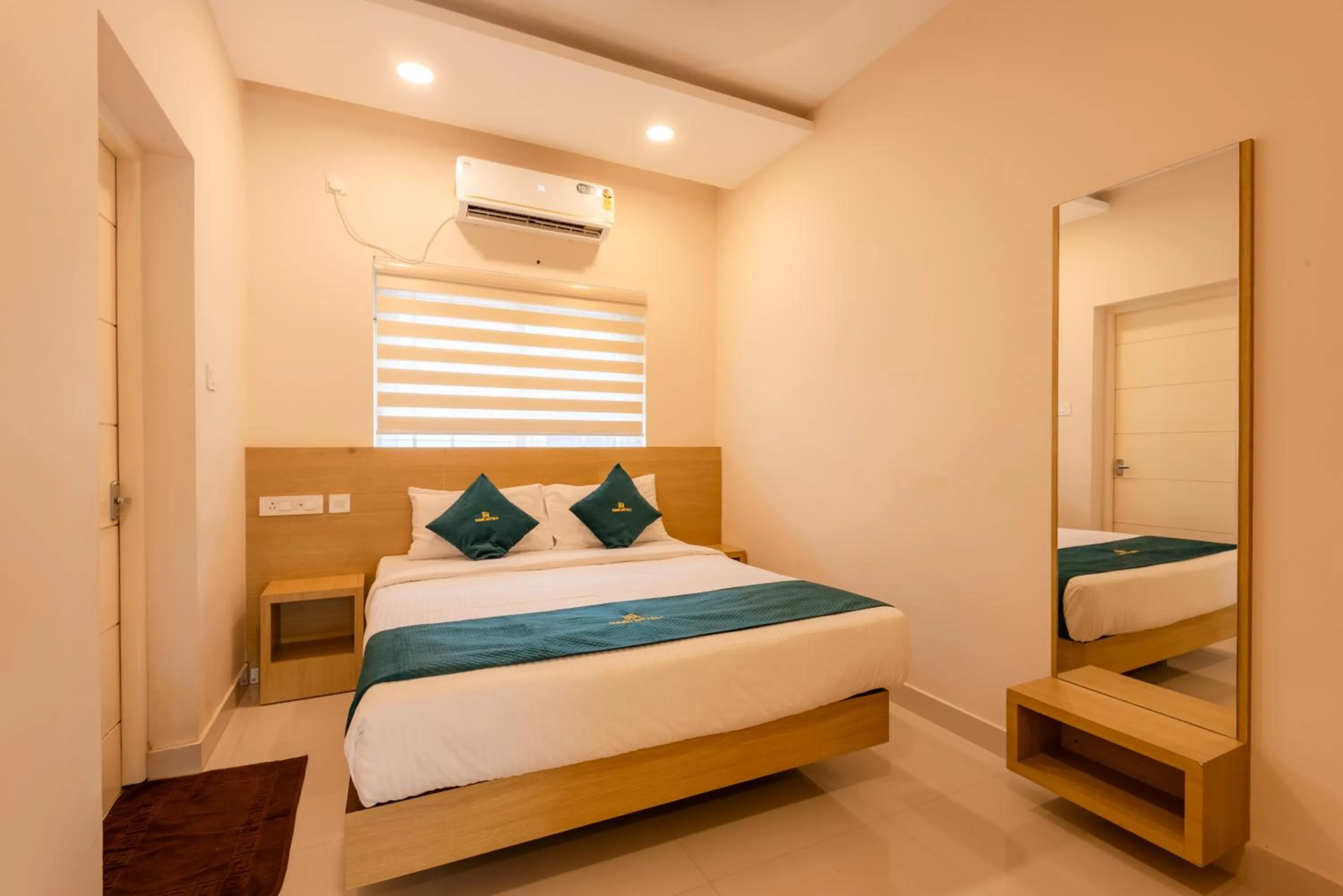 Bed in Daan Ambalath Maple Leaves