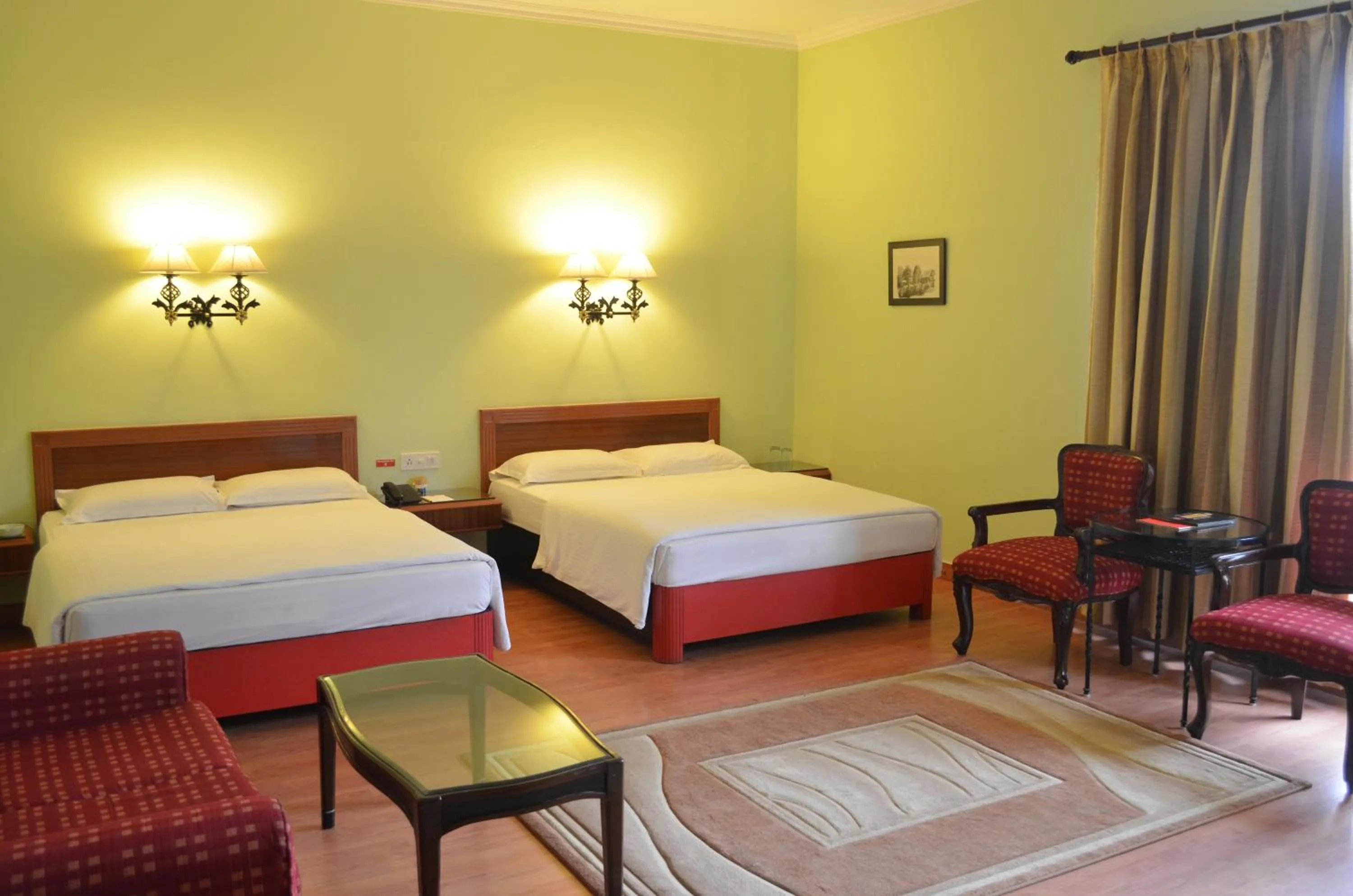 Photo of the whole room, Bed in The Radha Ashok