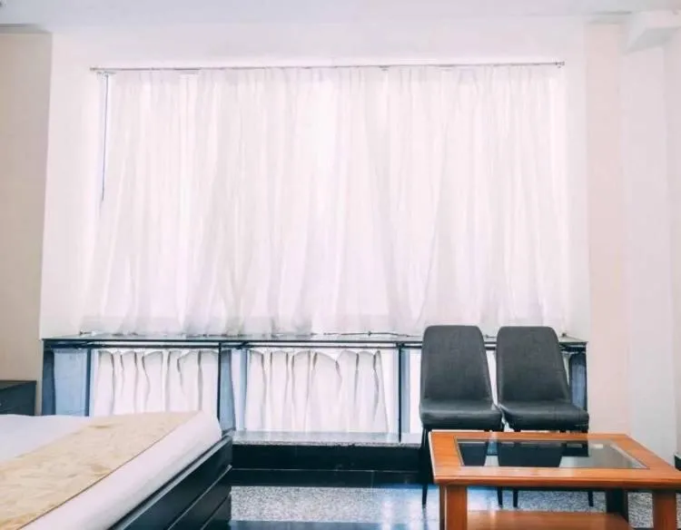 Living room, Bed in Hotel Suraj Palace