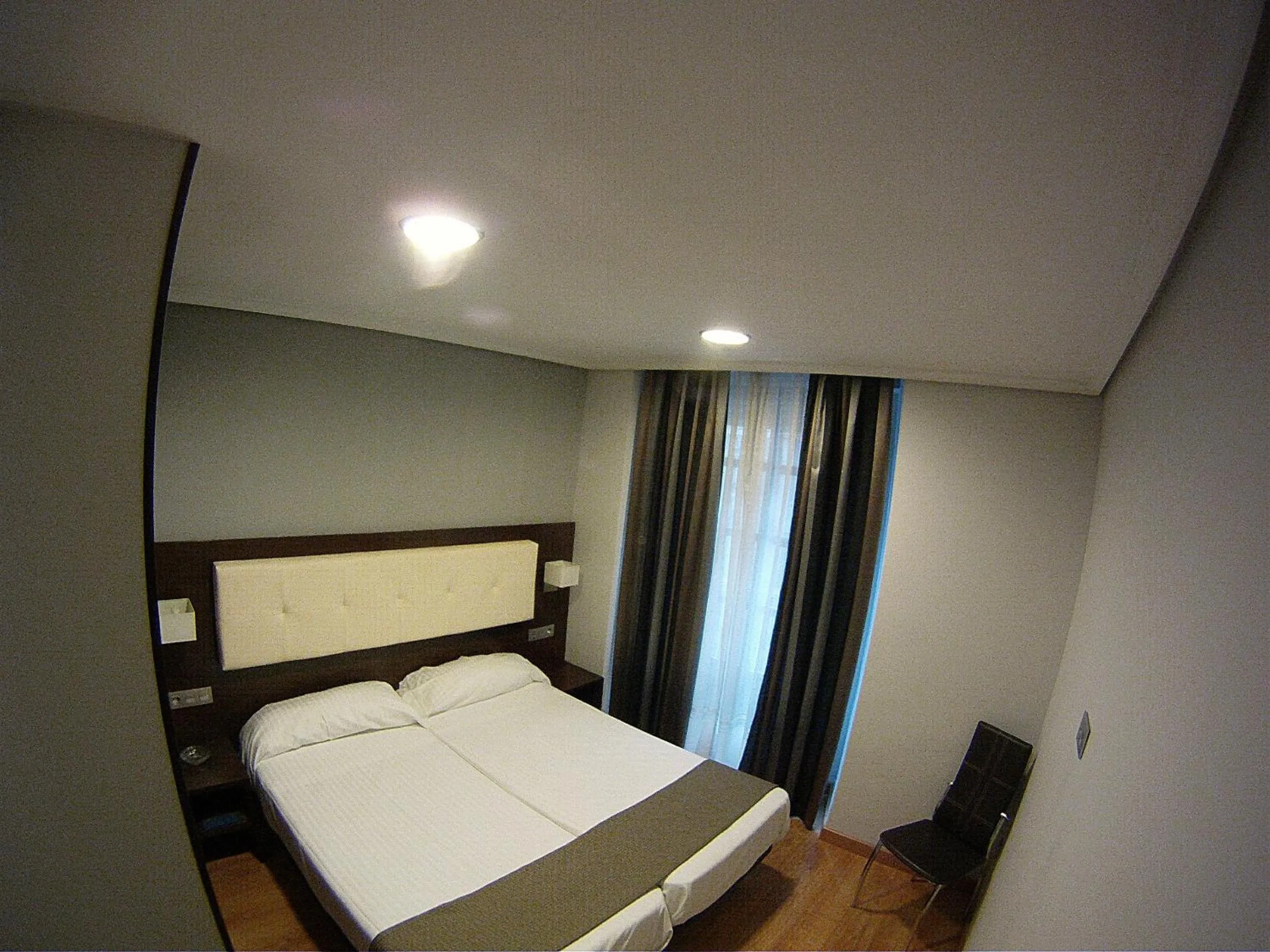 Photo of the whole room, Bed in Apartamentos Boutique Catedral
