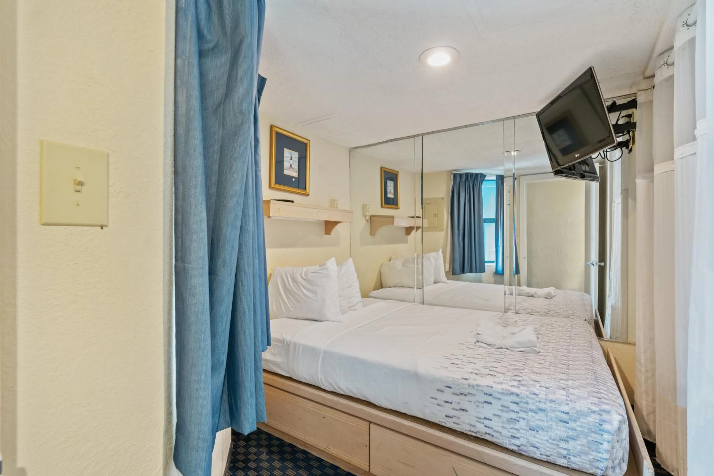 Bed in Yachtsman Oceanfront Resort