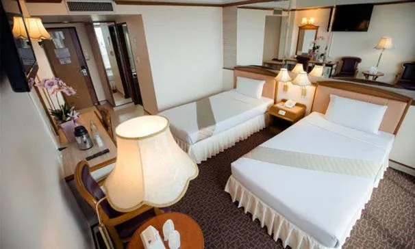 Bed in V.L. Hatyai Hotel