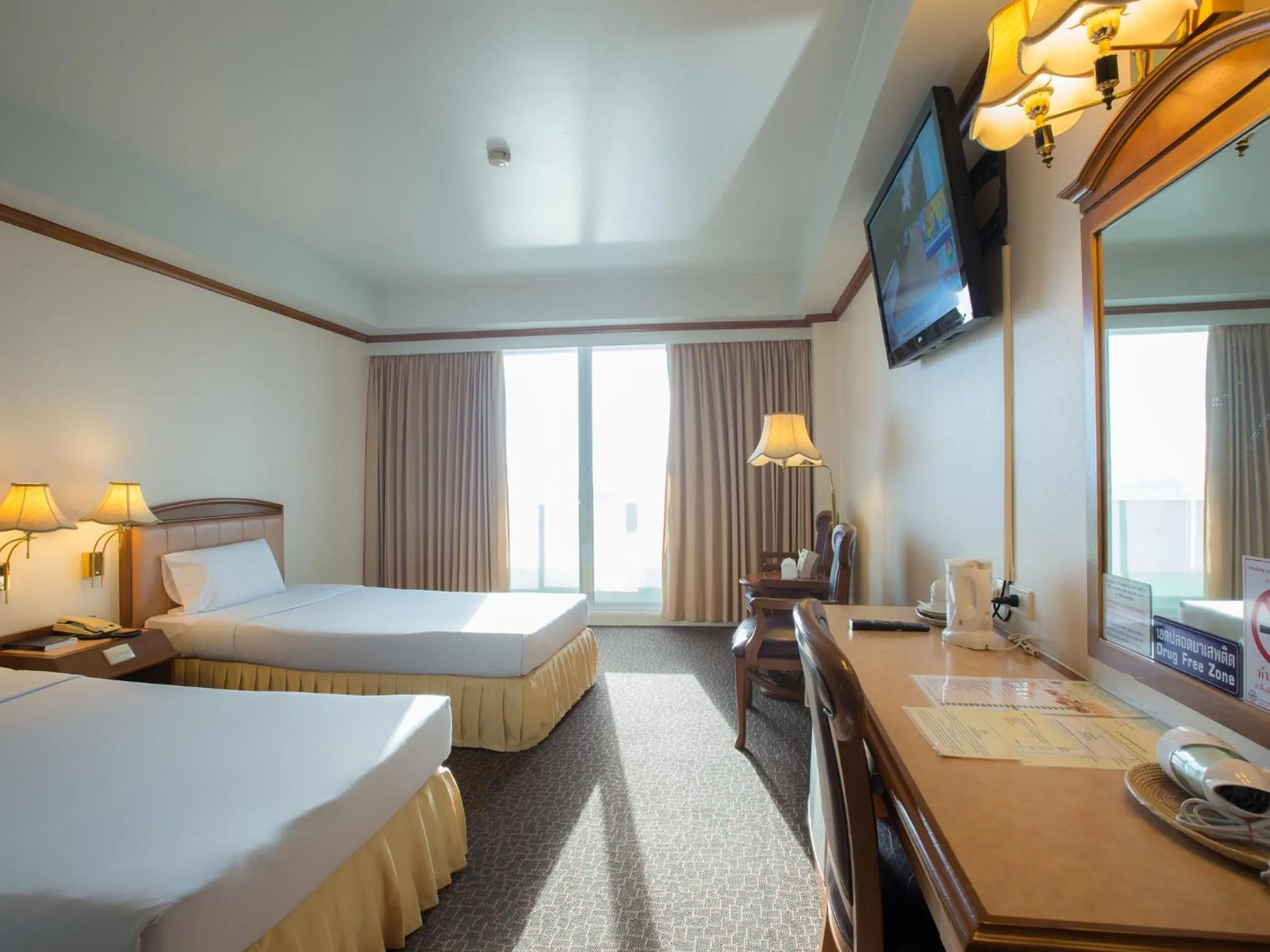 Bed in V.L. Hatyai Hotel