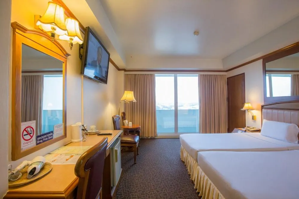 Bed in V.L. Hatyai Hotel