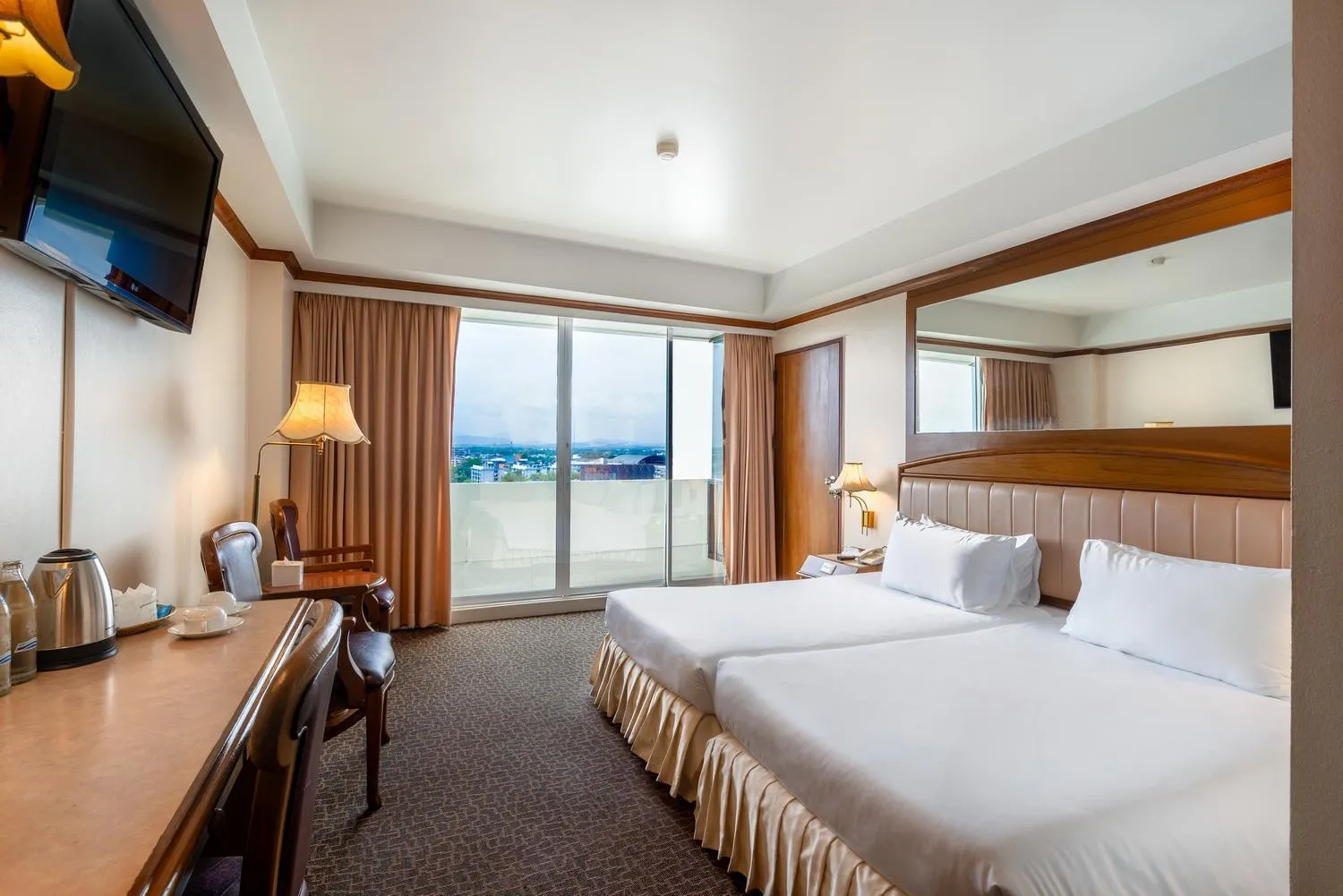 Bed in V.L. Hatyai Hotel